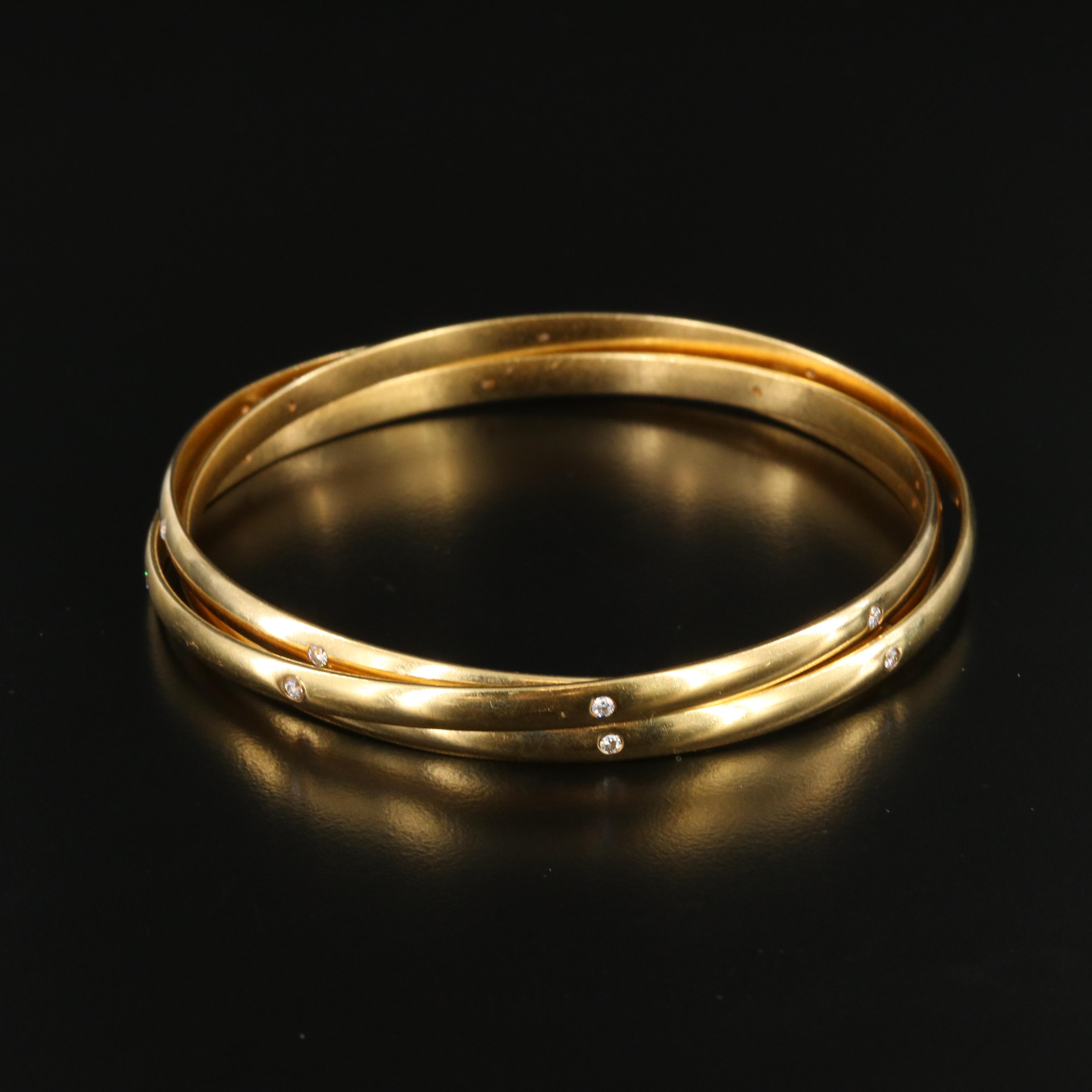 18K CTW 0.60 CTW Diamond Rolling Bangle Bracelets