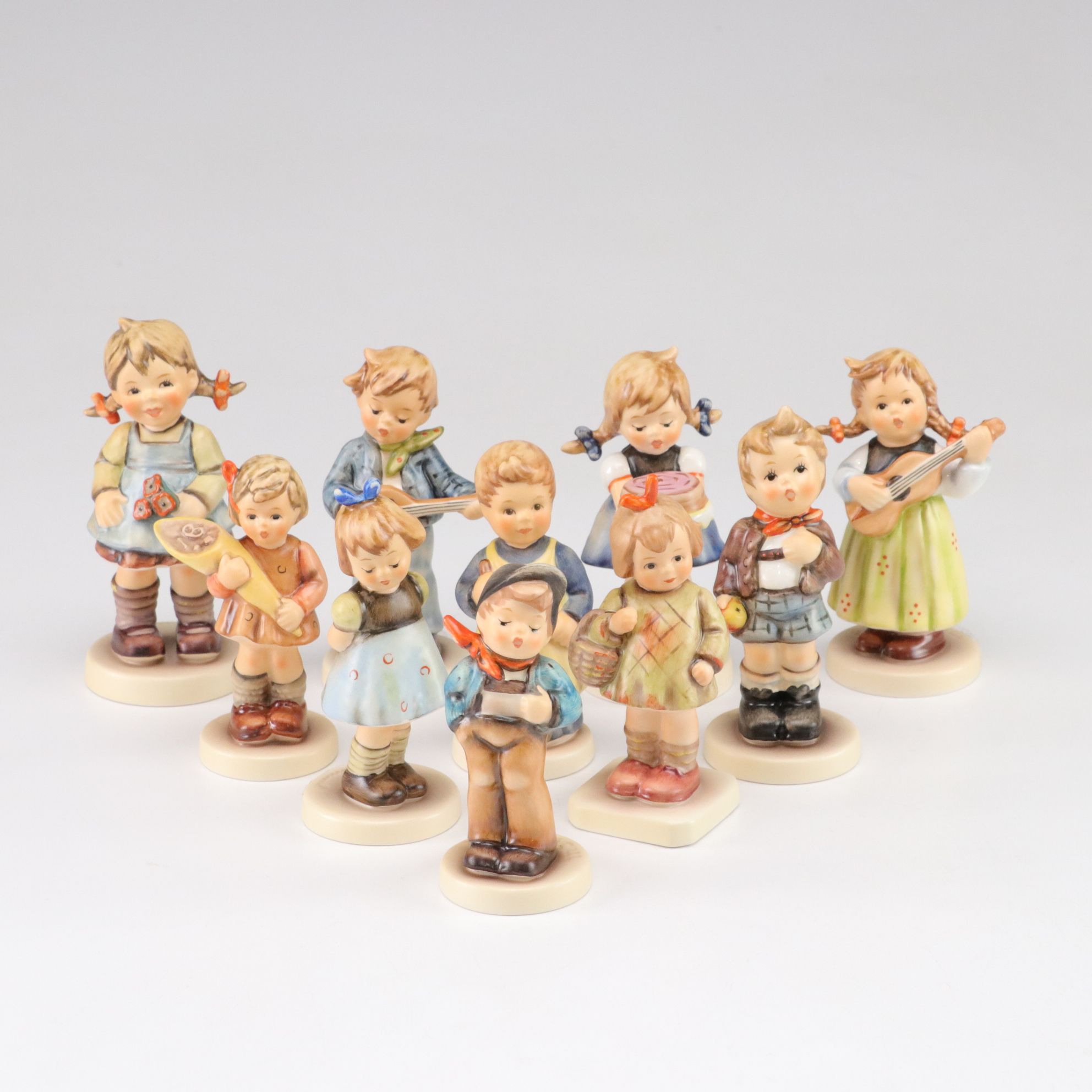 Goebel "Flower Girl" and "Strum Along" with More Hummel Porcelain Figurines