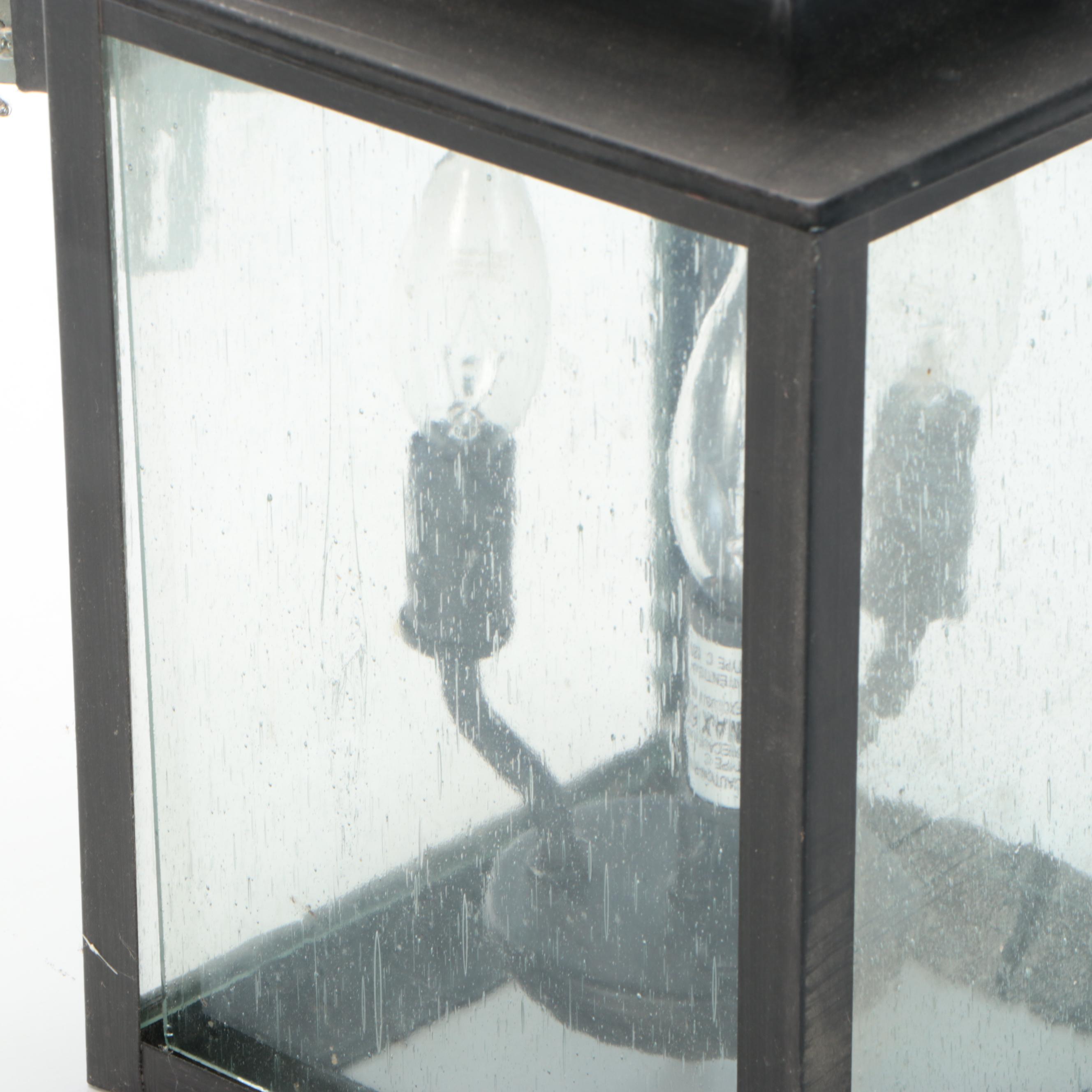 Contemporary Matte Black and Seed Glass Wall Mount Lantern, 2015