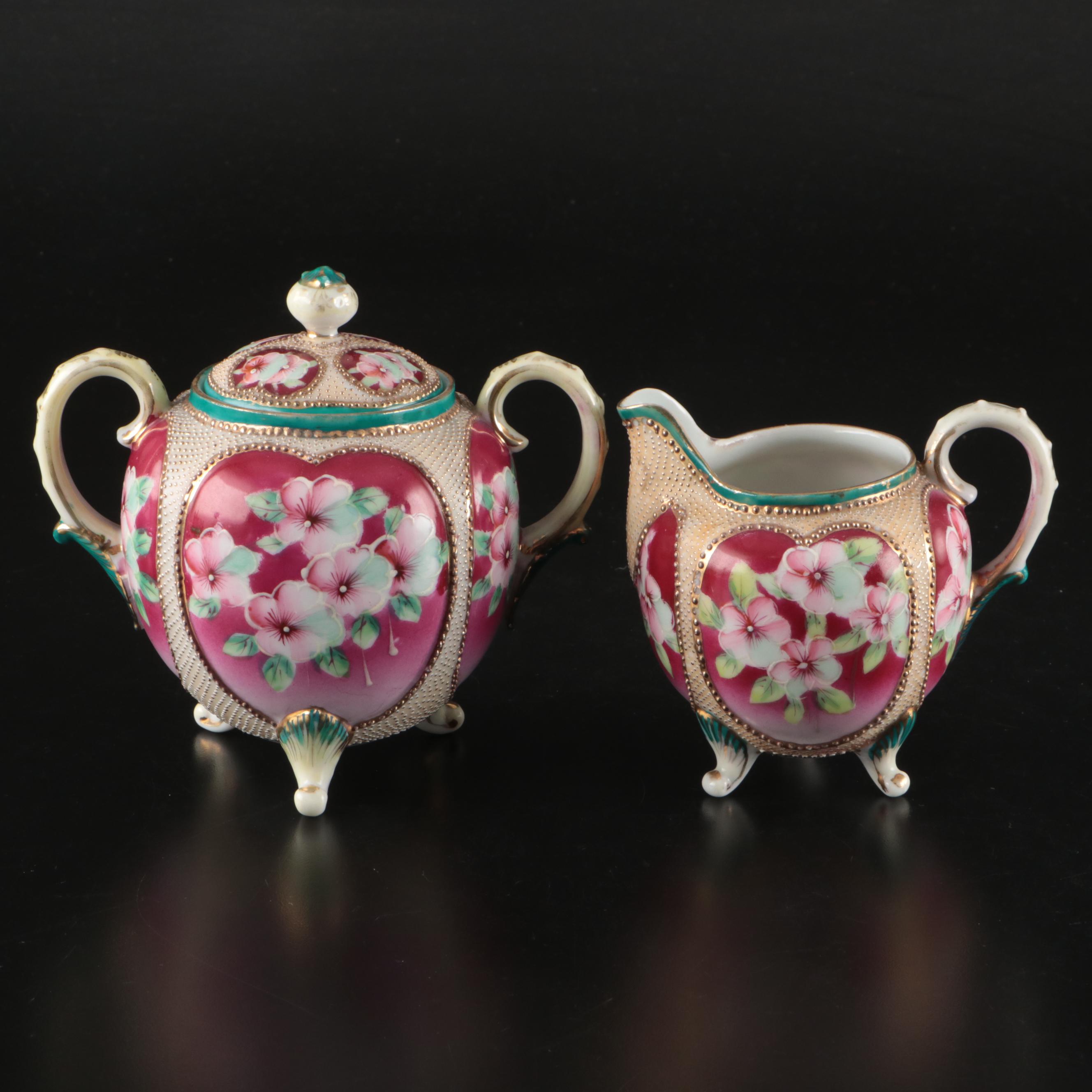 Nippon Porcelain Moriage Accented Creamer and Sugar Sets and Other Tableware