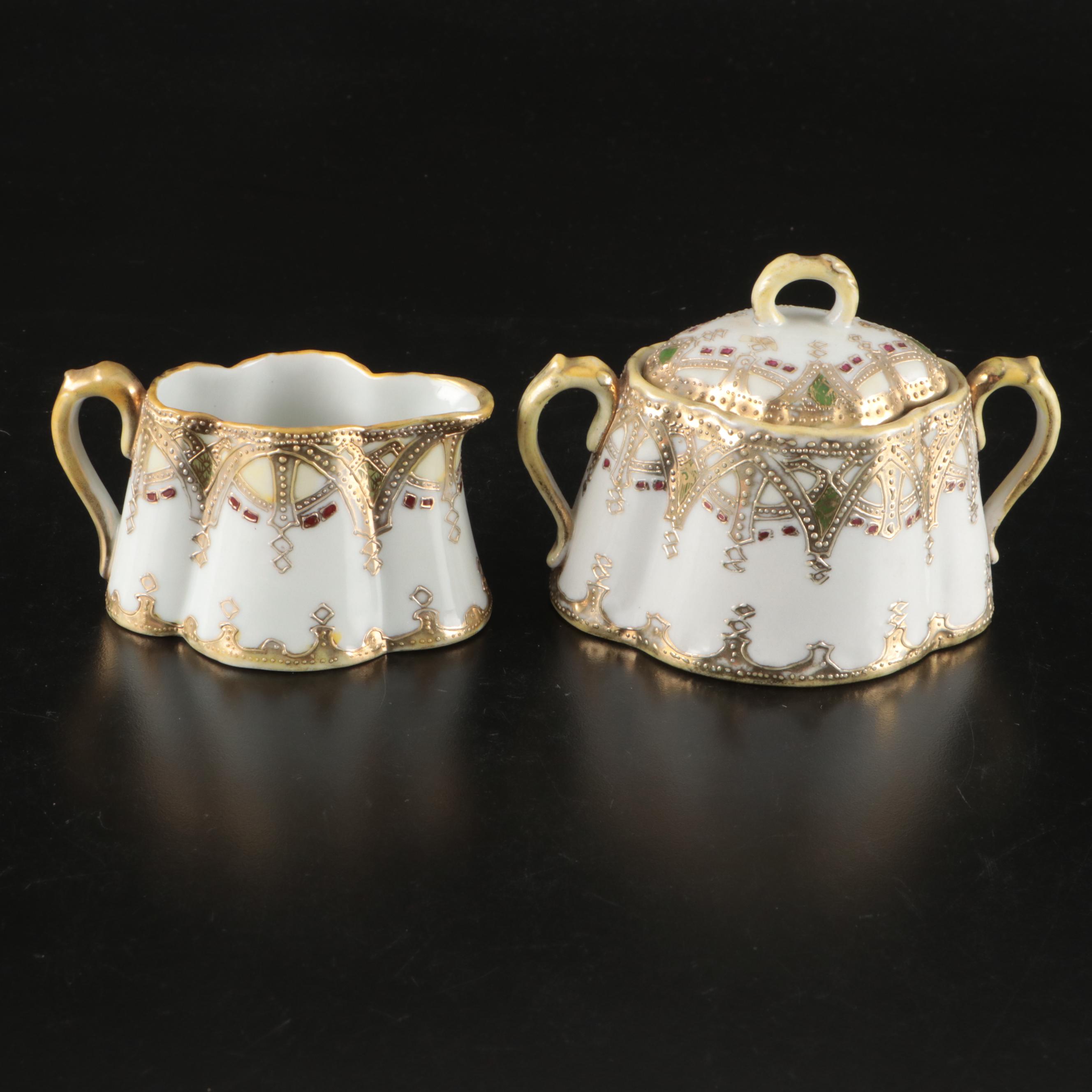 Nippon Porcelain Moriage Accented Creamer and Sugar Sets and Other Tableware