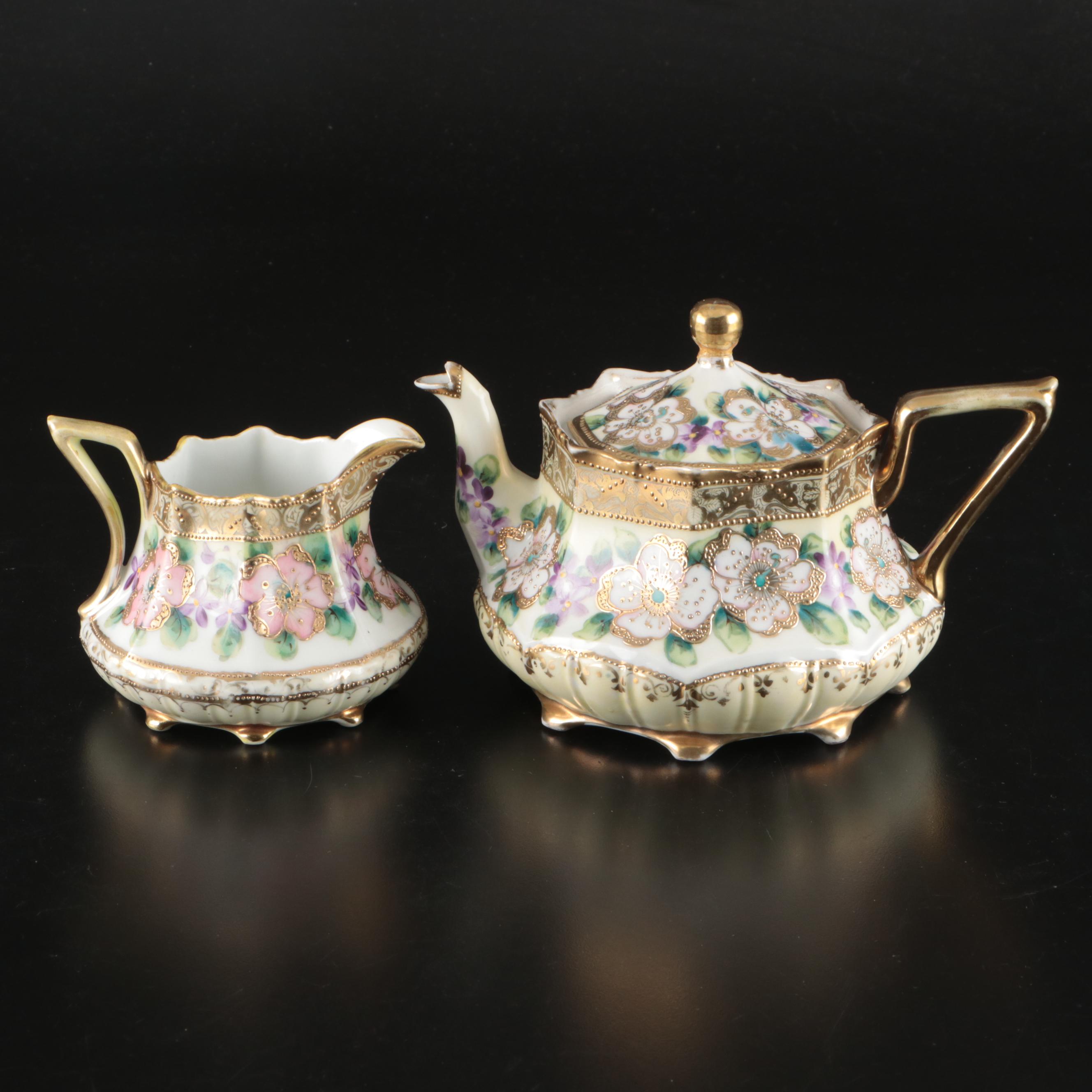 Nippon Porcelain Moriage Accented Creamer and Sugar Sets and Other Tableware