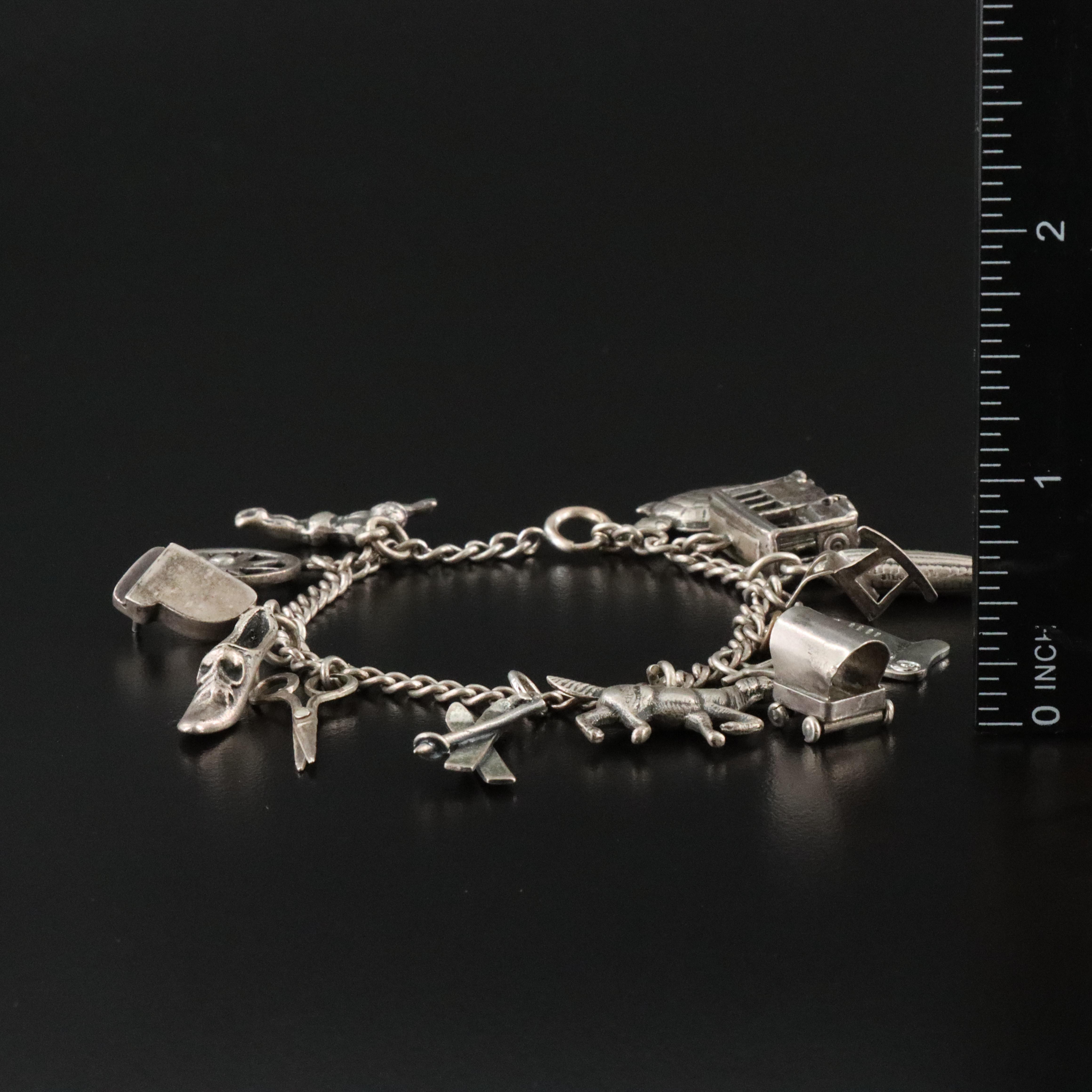 Charm Bracelets Including Vintage, Articulated, Travel and Sterling