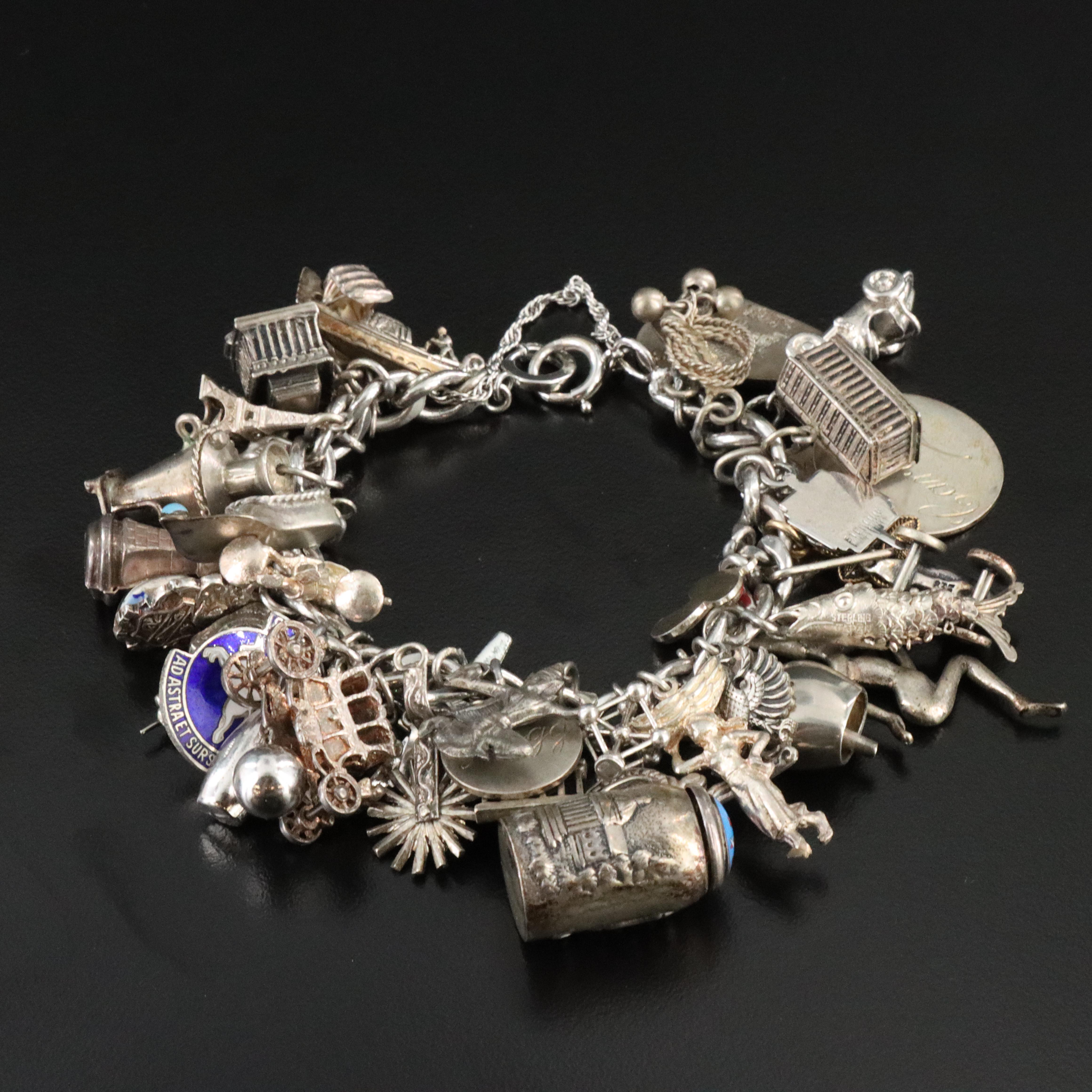 Charm Bracelets Including Vintage, Articulated, Travel and Sterling