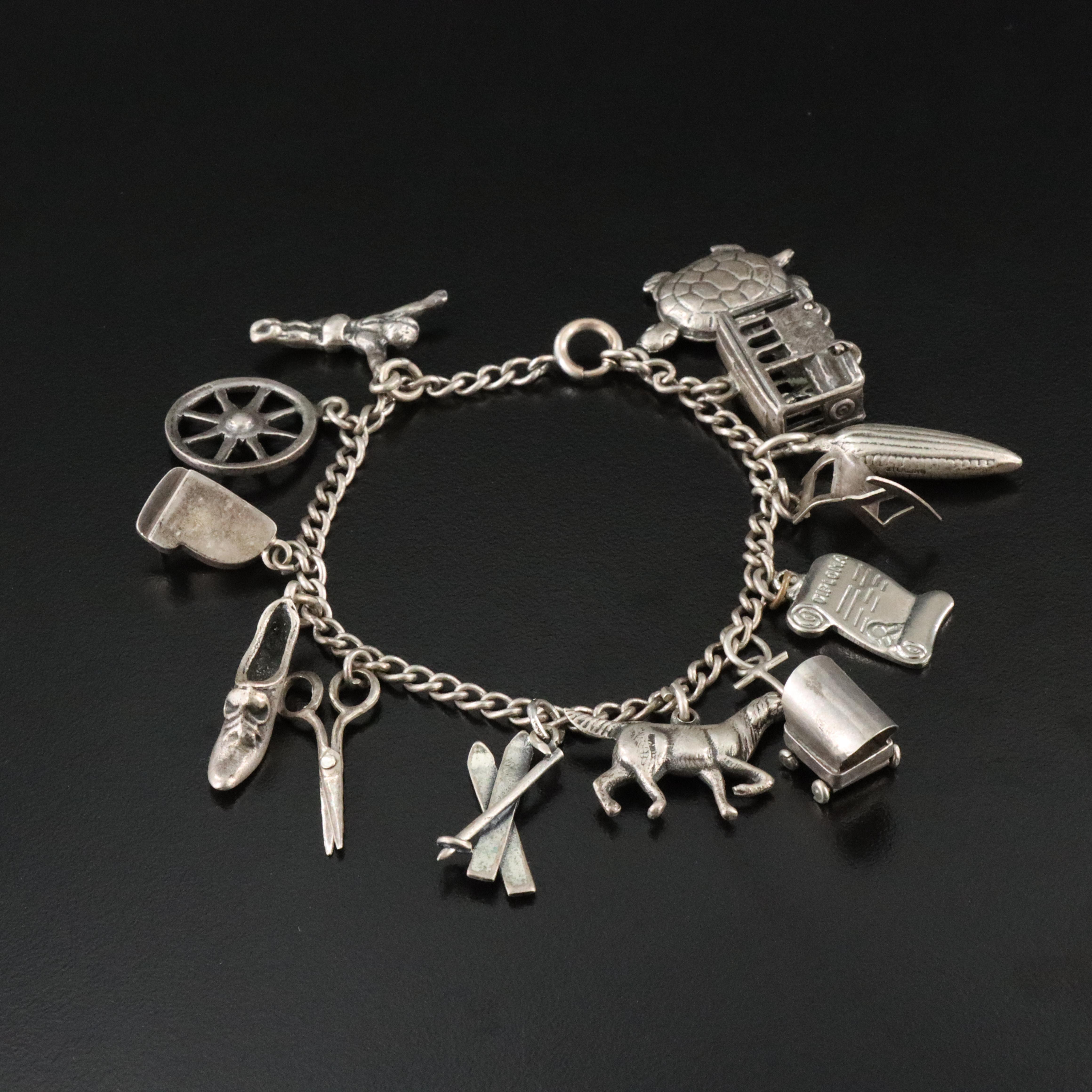 Charm Bracelets Including Vintage, Articulated, Travel and Sterling