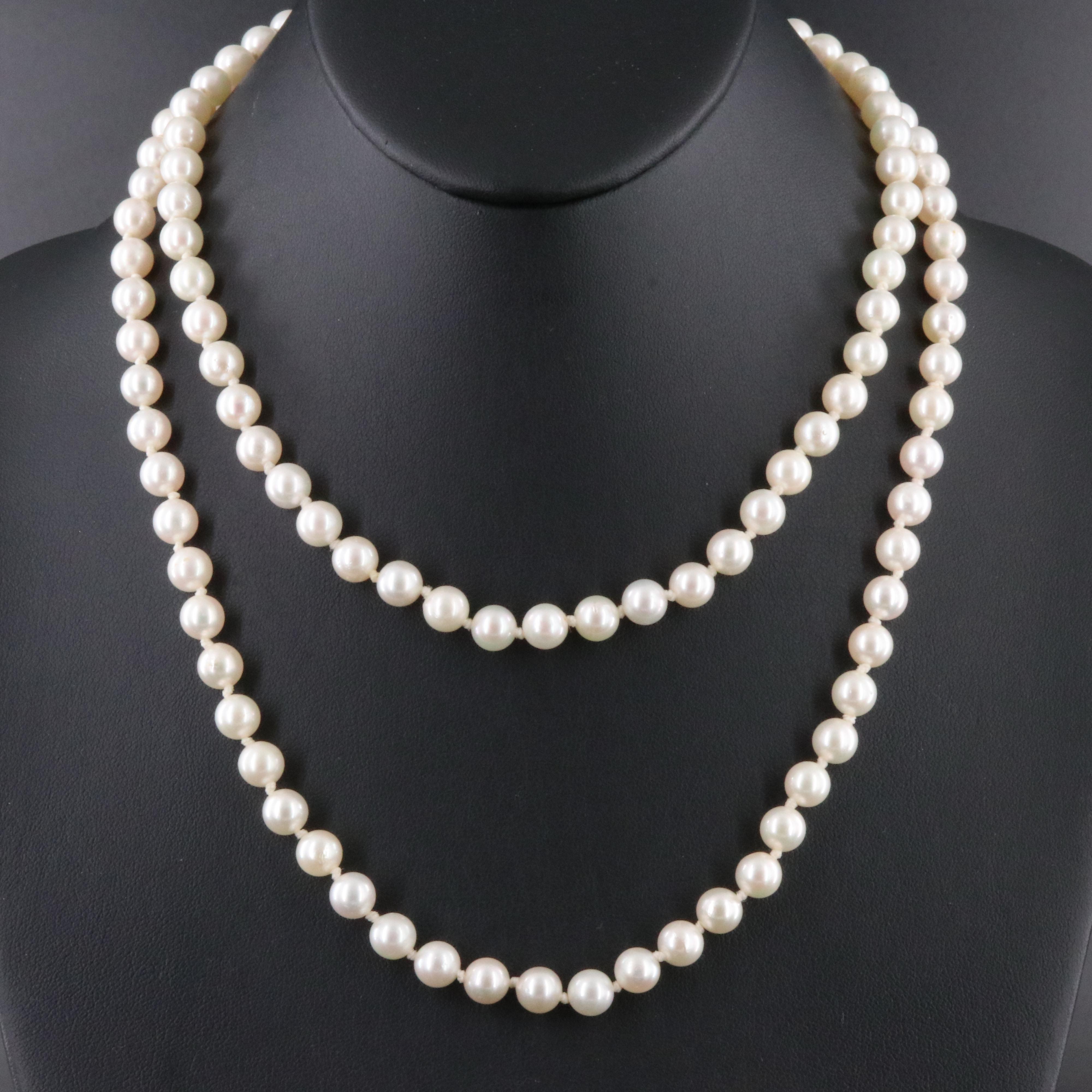 Pearl Necklace with 14K Flower Clasp