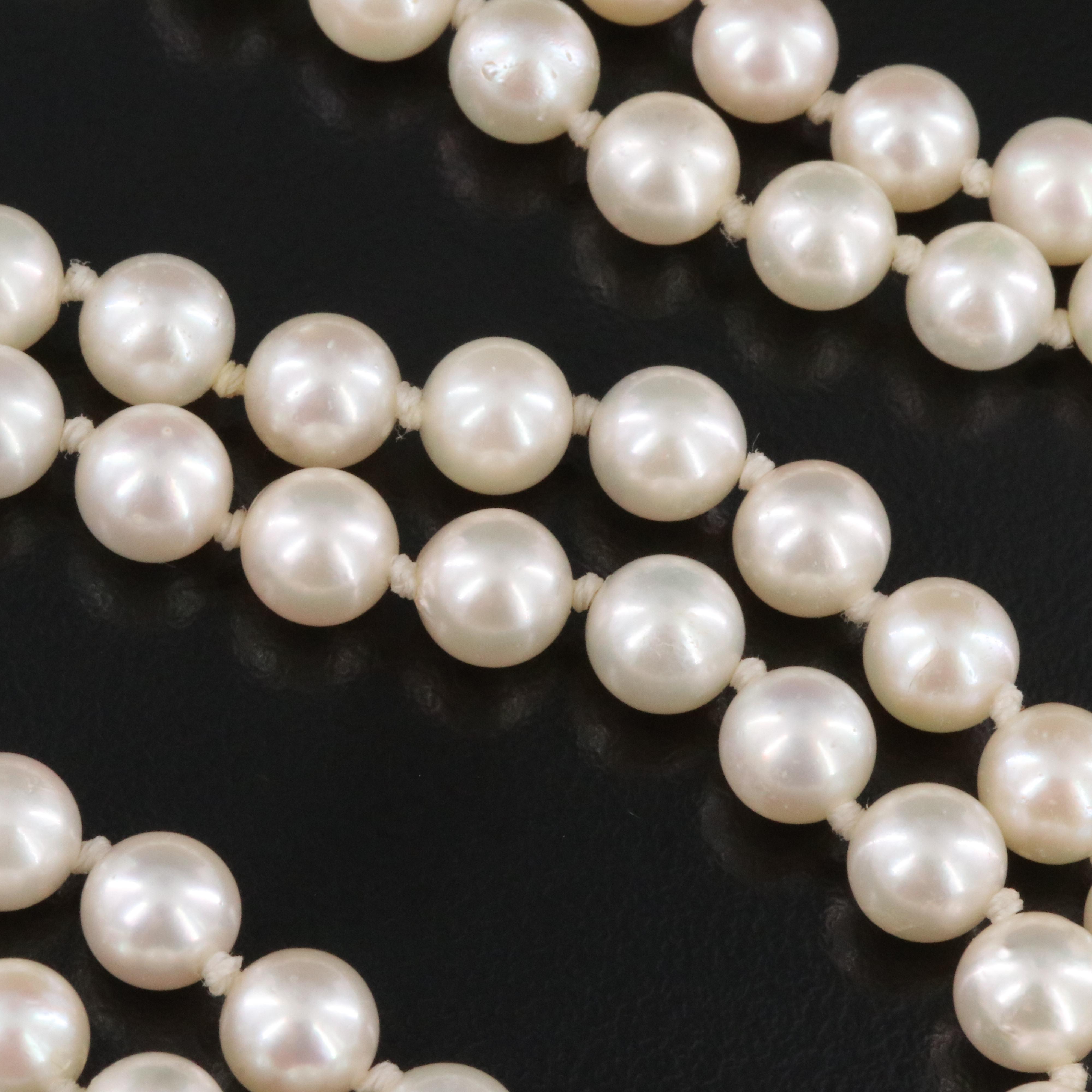Pearl Necklace with 14K Flower Clasp