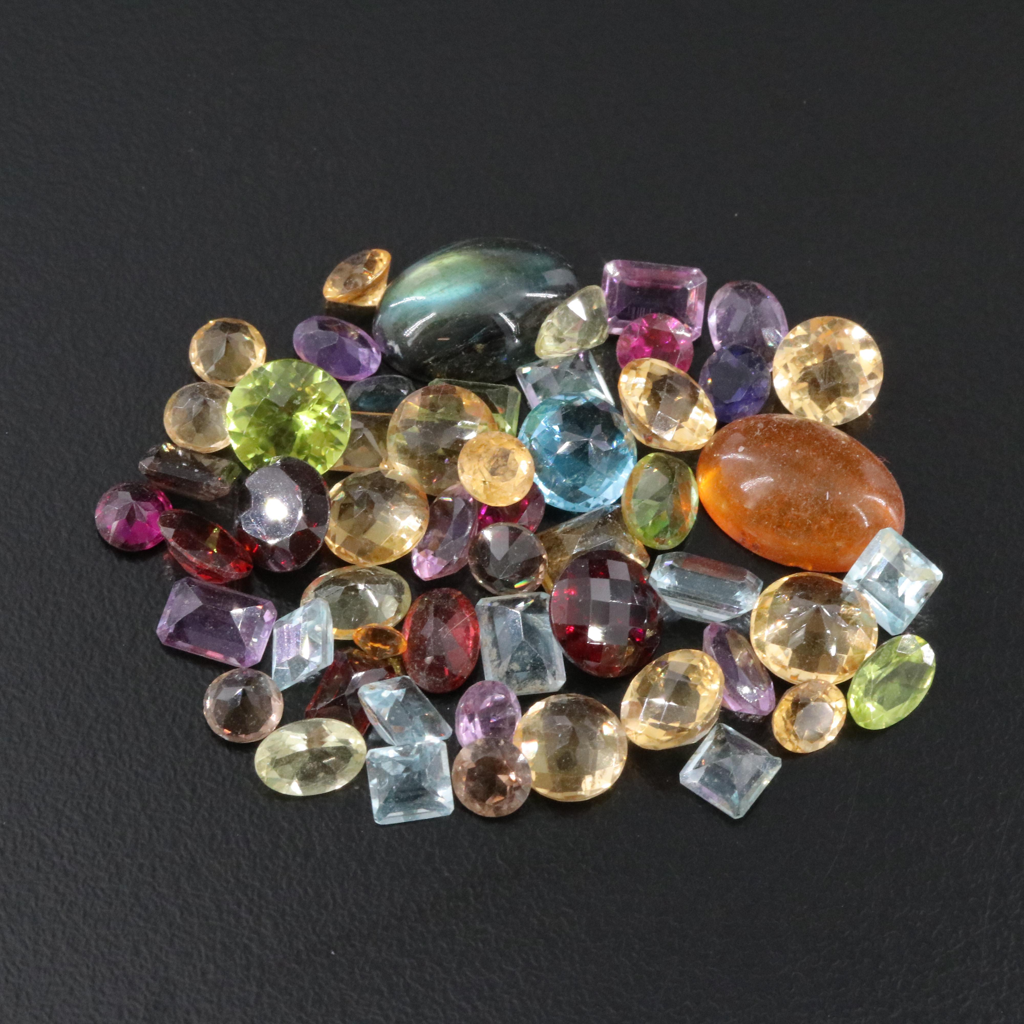 Loose 51.46 CTW Gemstone Lot Including Labradorite, Peridot and Topaz