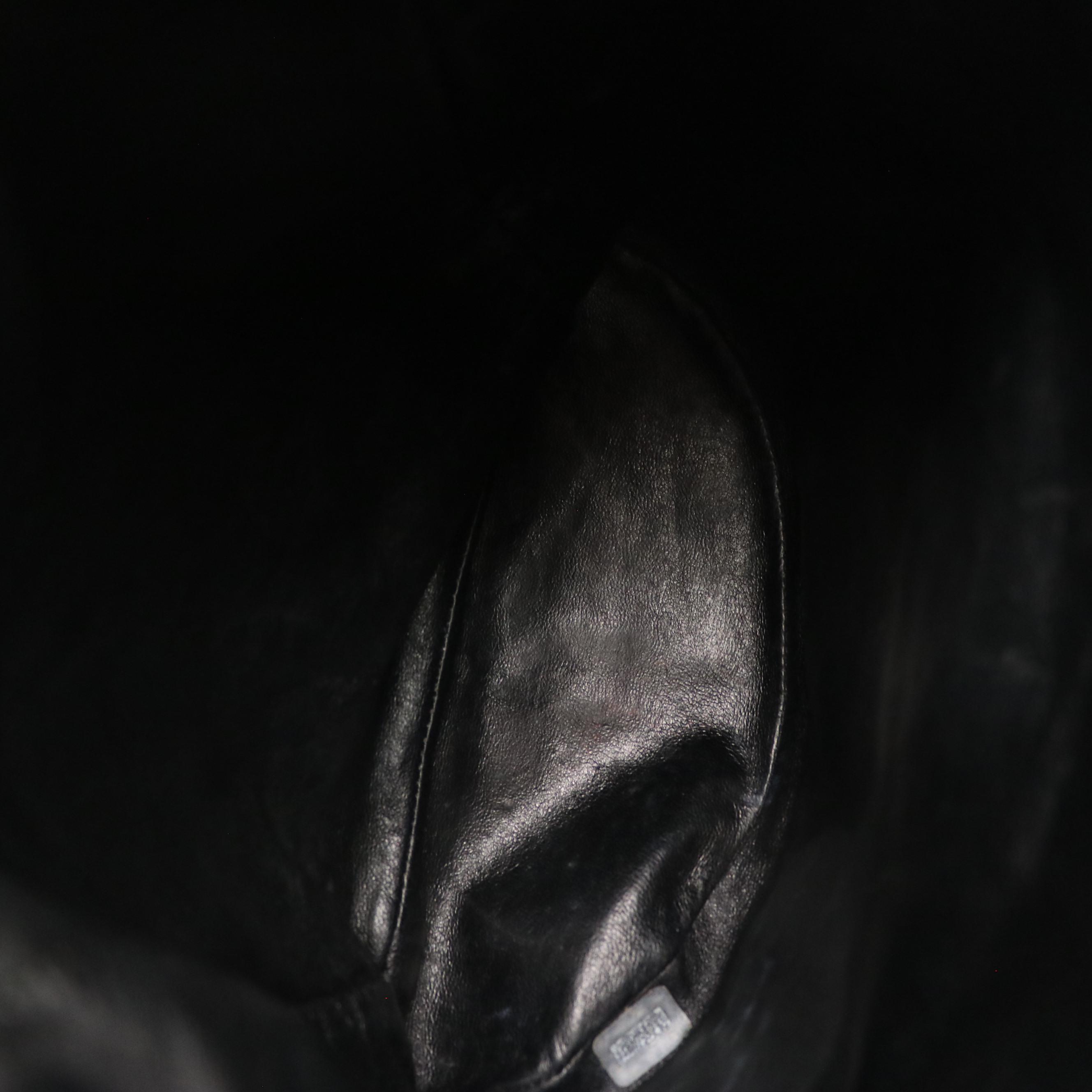 Chanel CC Drawstring Chain Strap Backpack in Black Quilted Leather