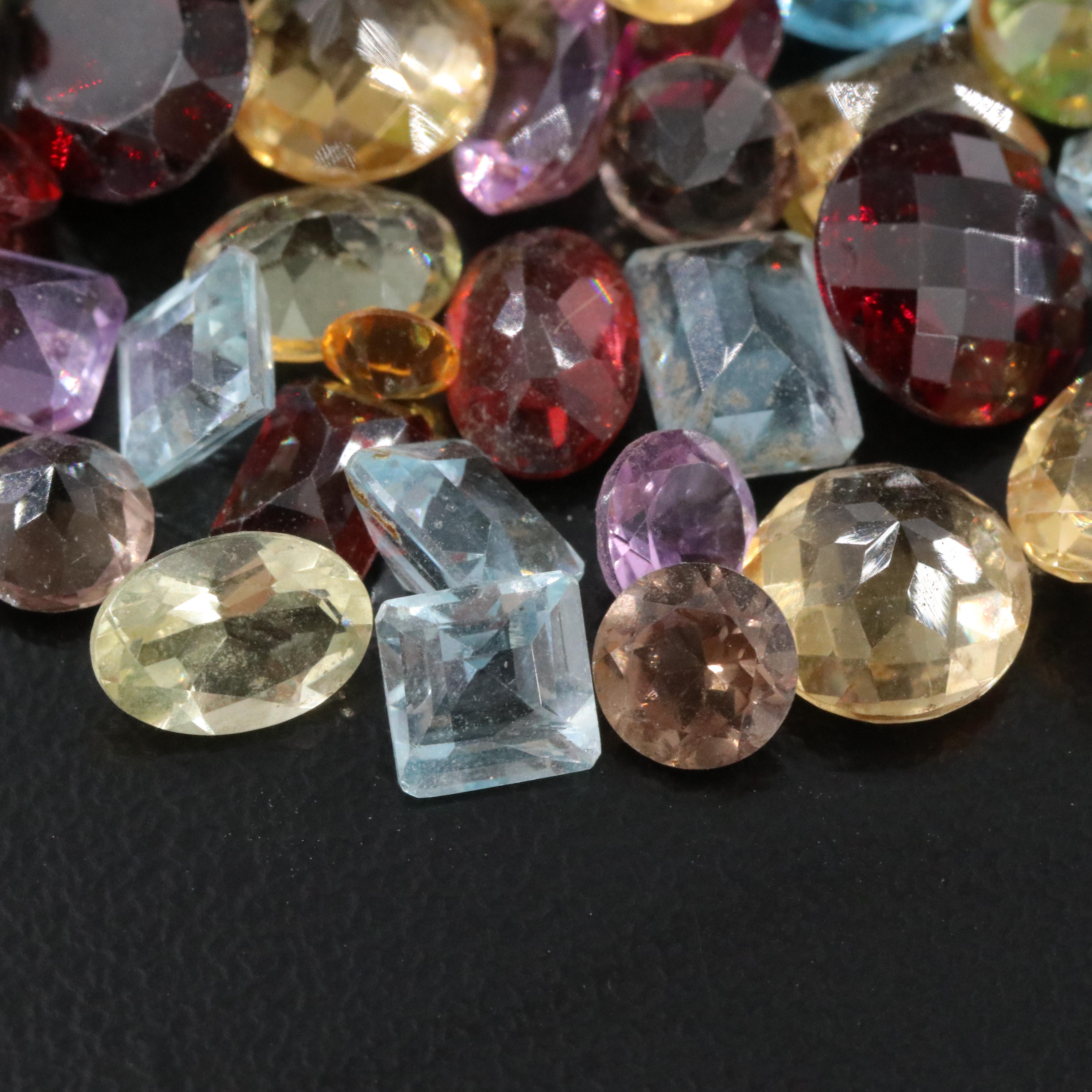 Loose 51.46 CTW Gemstone Lot Including Labradorite, Peridot and Topaz