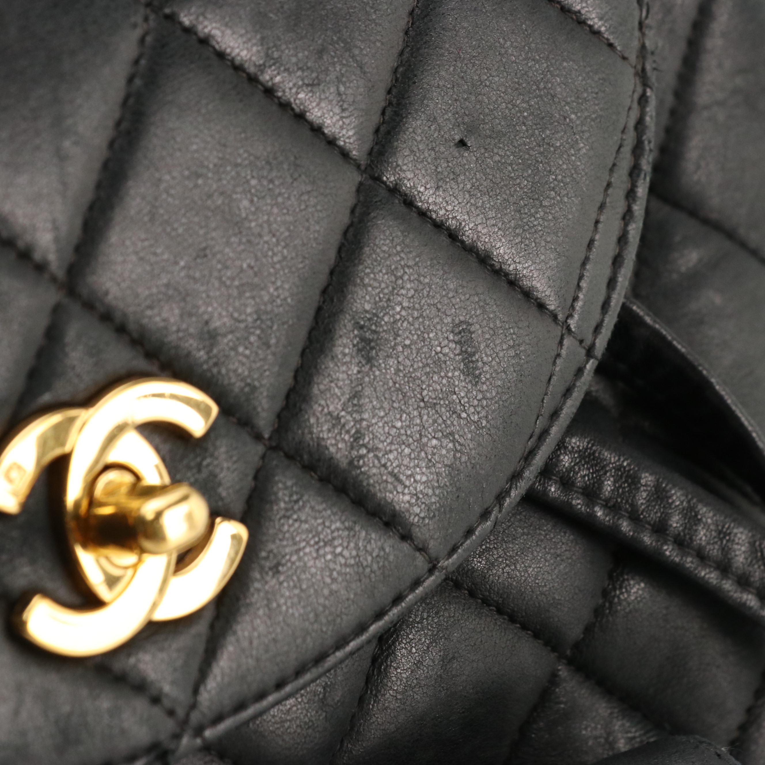 Chanel CC Drawstring Chain Strap Backpack in Black Quilted Leather