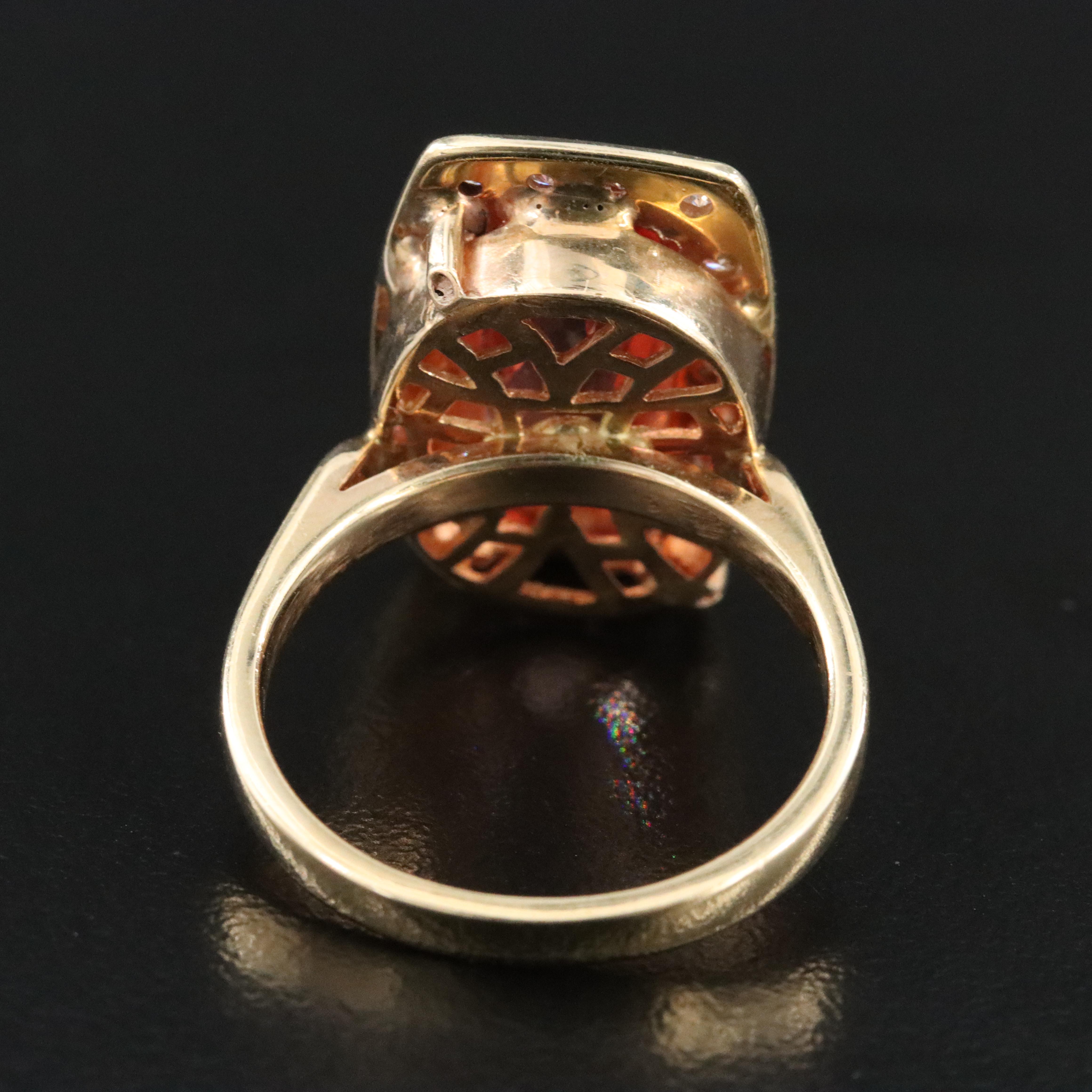 14K Topaz and 0.50 CTW Diamond Ring