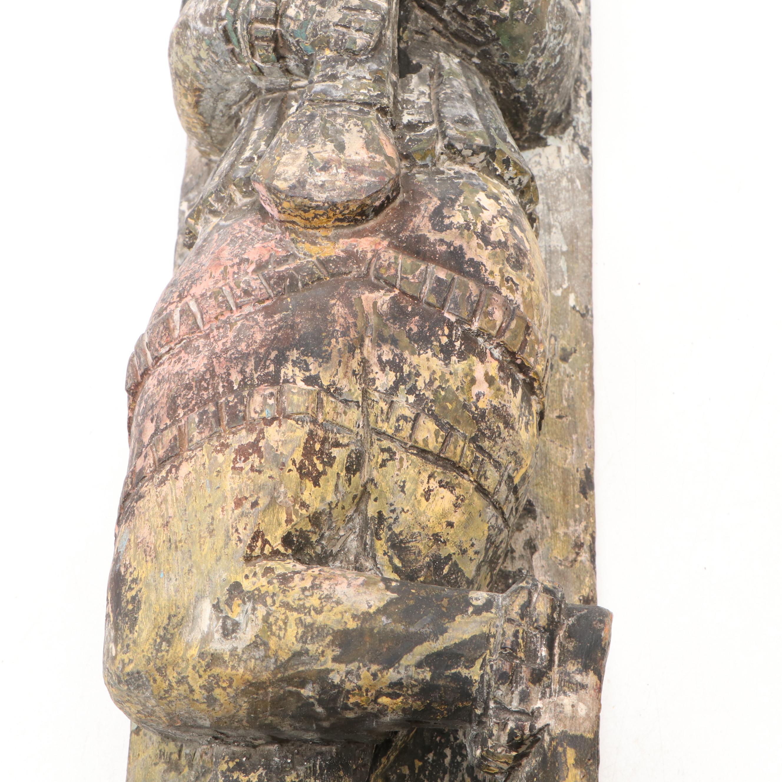 Southeast Asian Style Polychrome and Carved Wood Sculpture Depicting a Musician