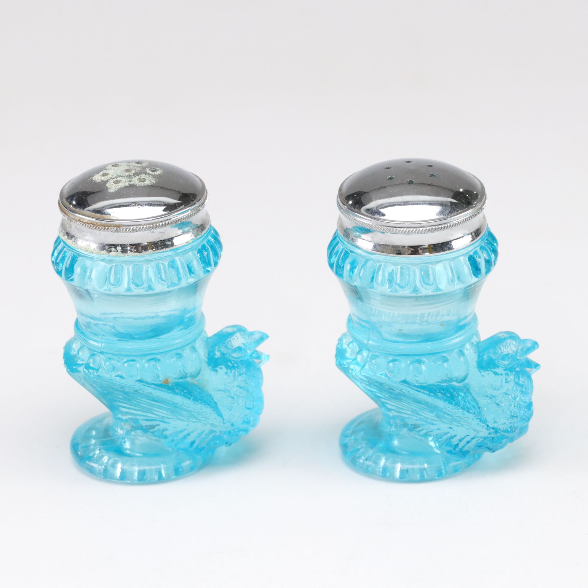 Light Blue Pressed Glass with L.G. Wright Iron Shaped Butter Dish