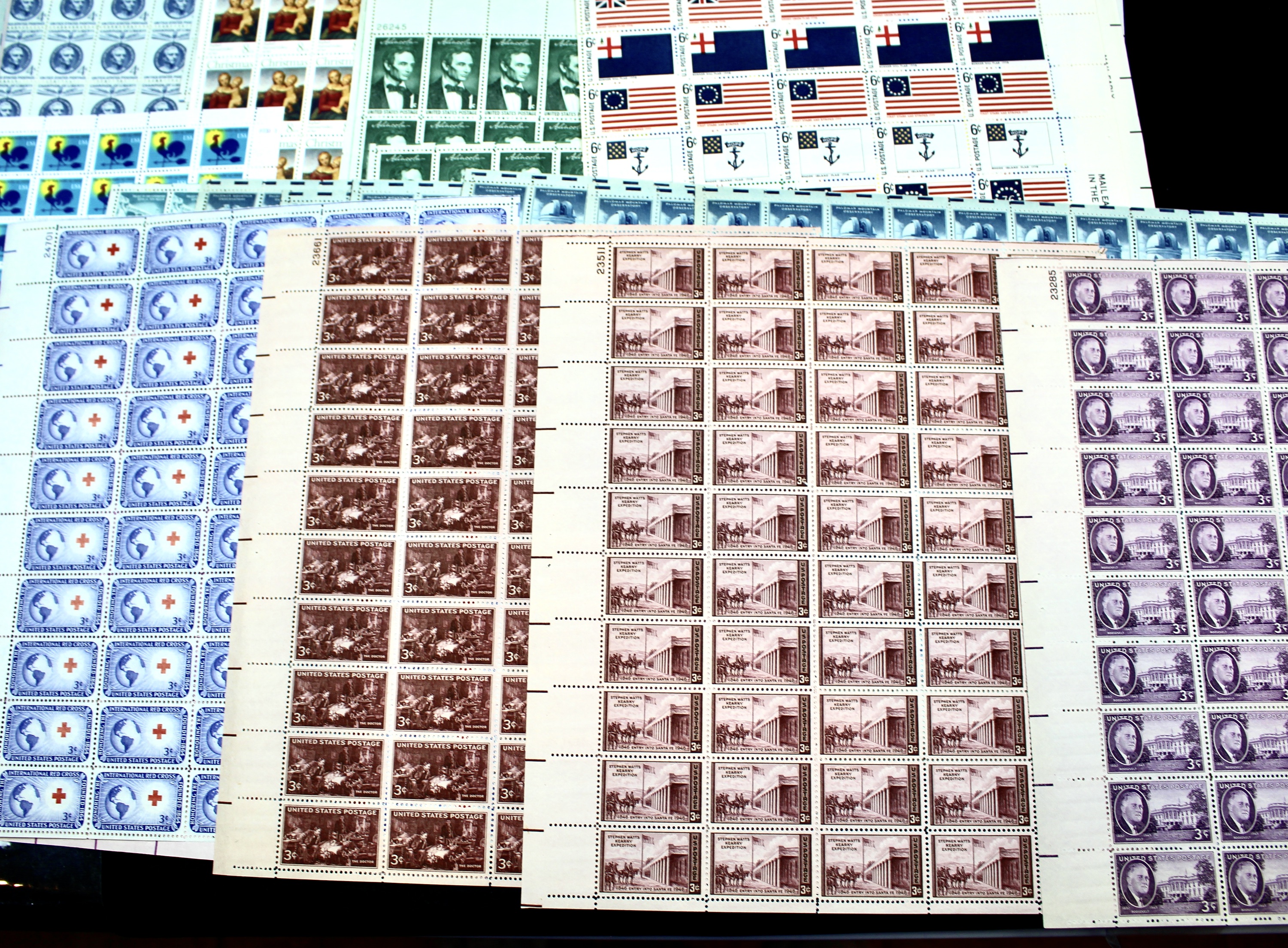Forty Mint Condition U.S. Postage Stamp Sheets