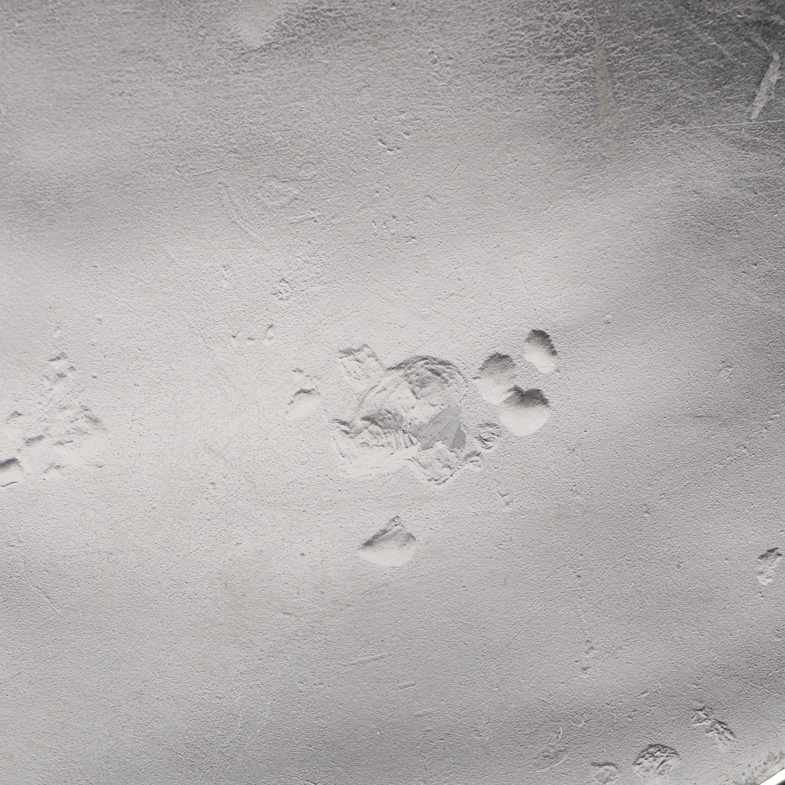 Abstract Metal Disk-Shaped Vase with Artificial Orchids