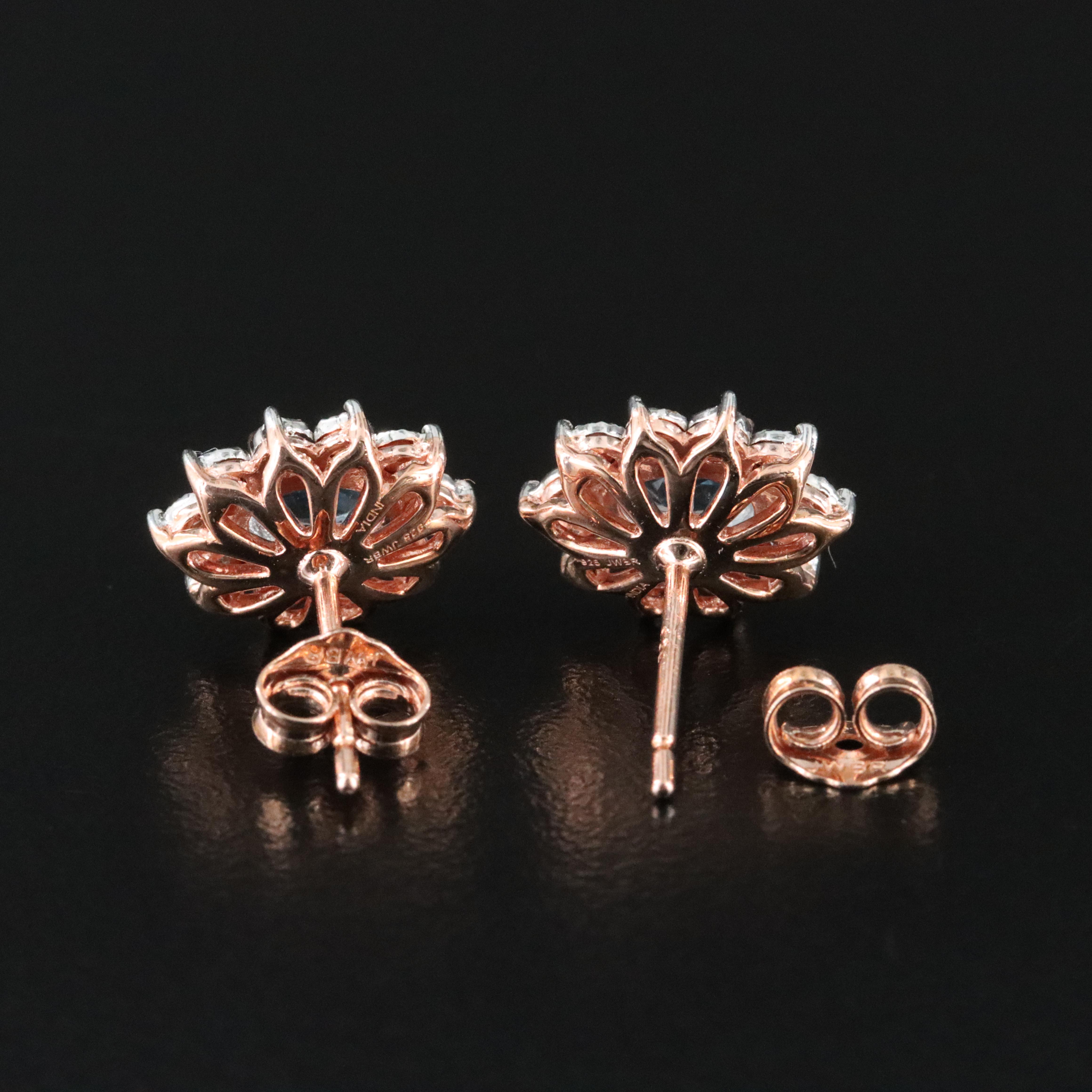 Sterling Sky Blue Topaz and Diamond Stud Earrings