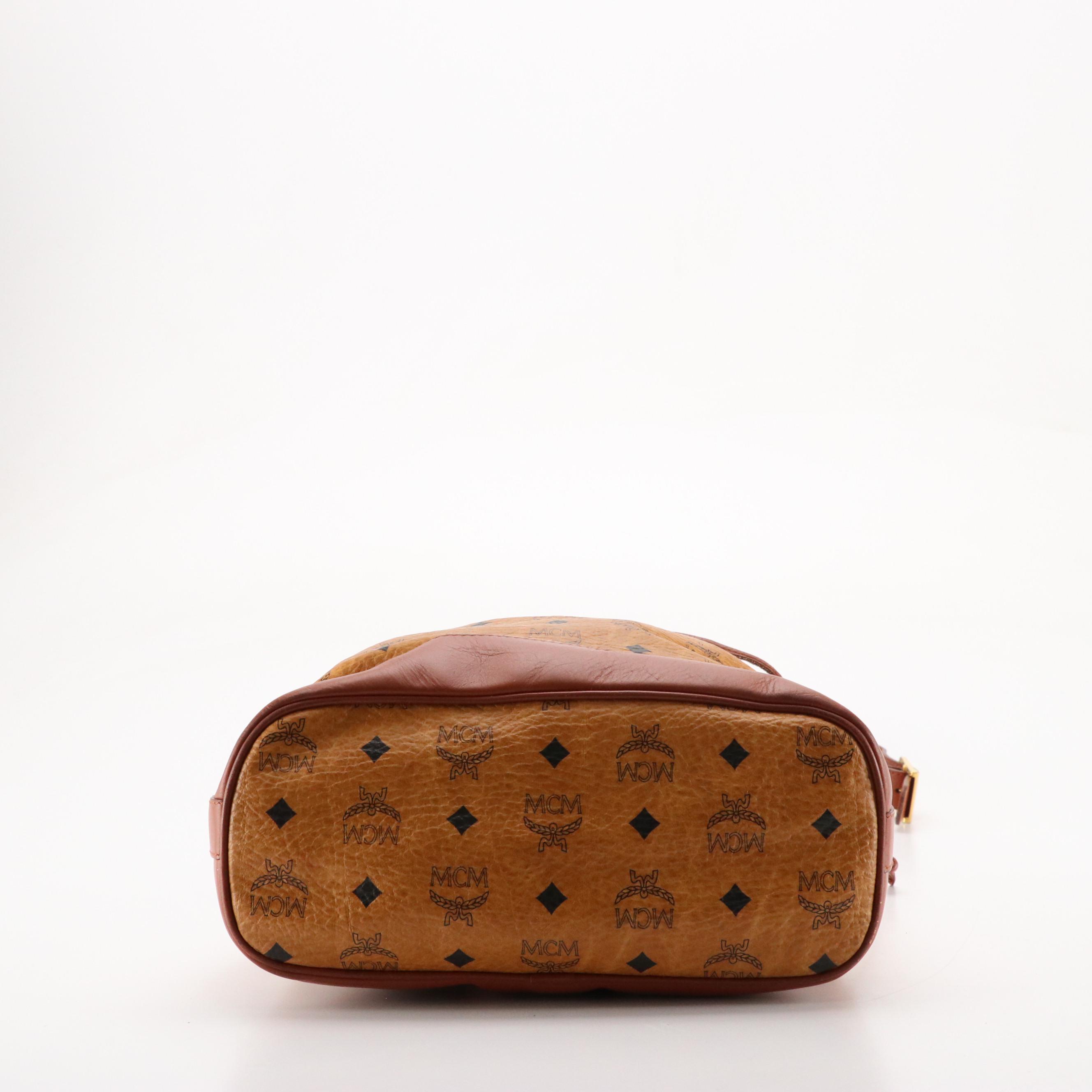 MCM Golf Collection Drawstring Bucket Bag in Cognac Visetos Canvas and Leather