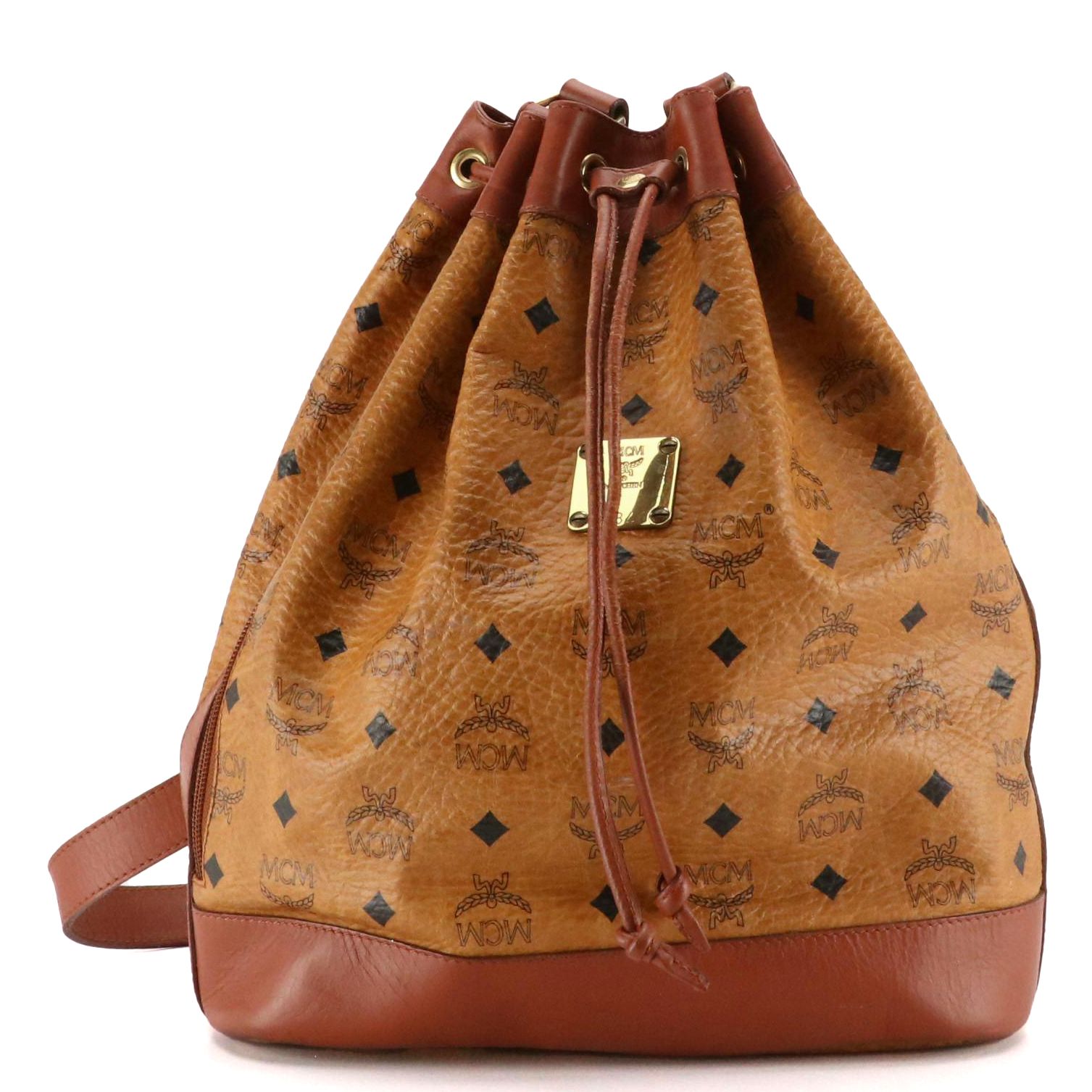 MCM Golf Collection Drawstring Bucket Bag in Cognac Visetos Canvas and Leather