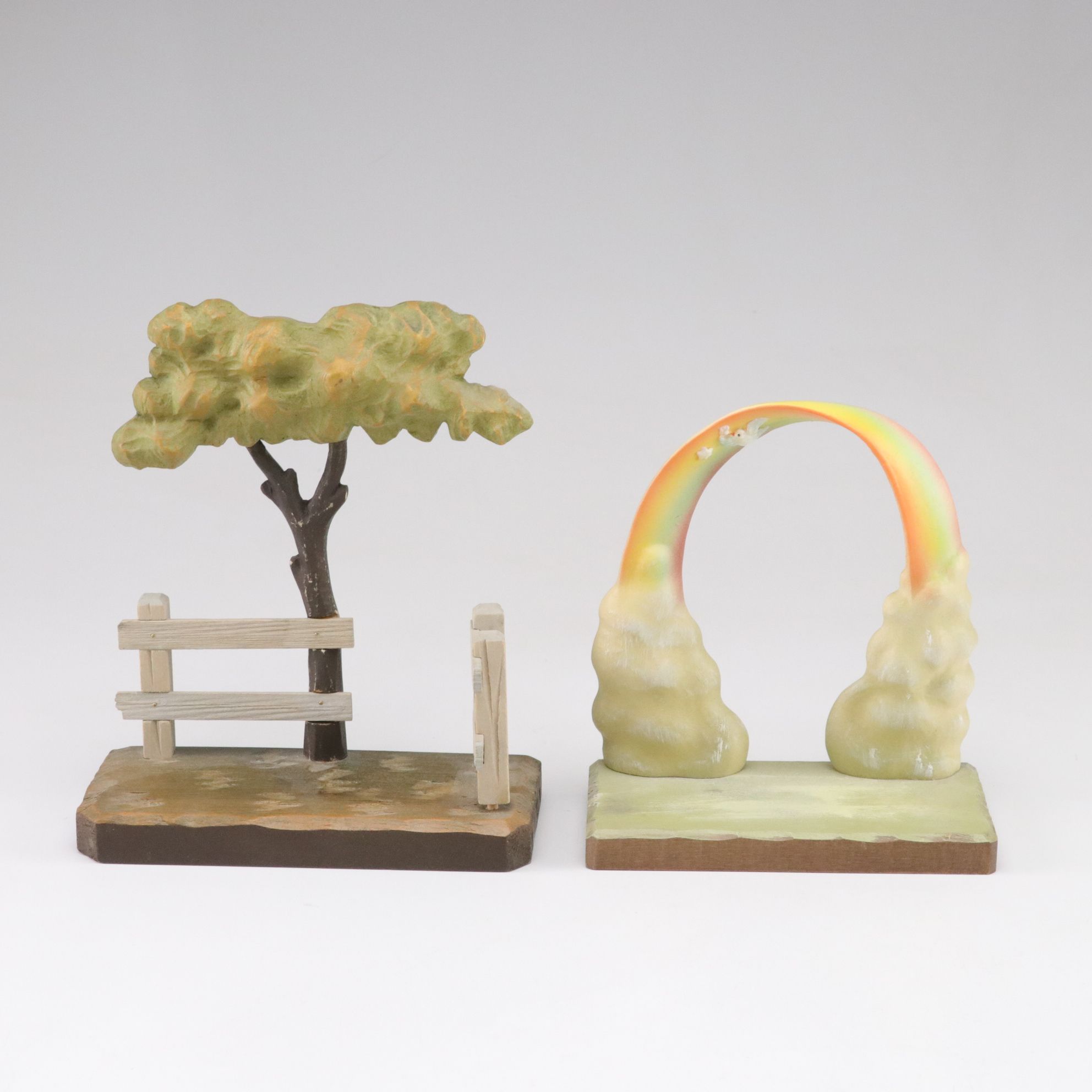 Eleven ANRI Painted Carved Wood Figurines of Children with Two Display Stands