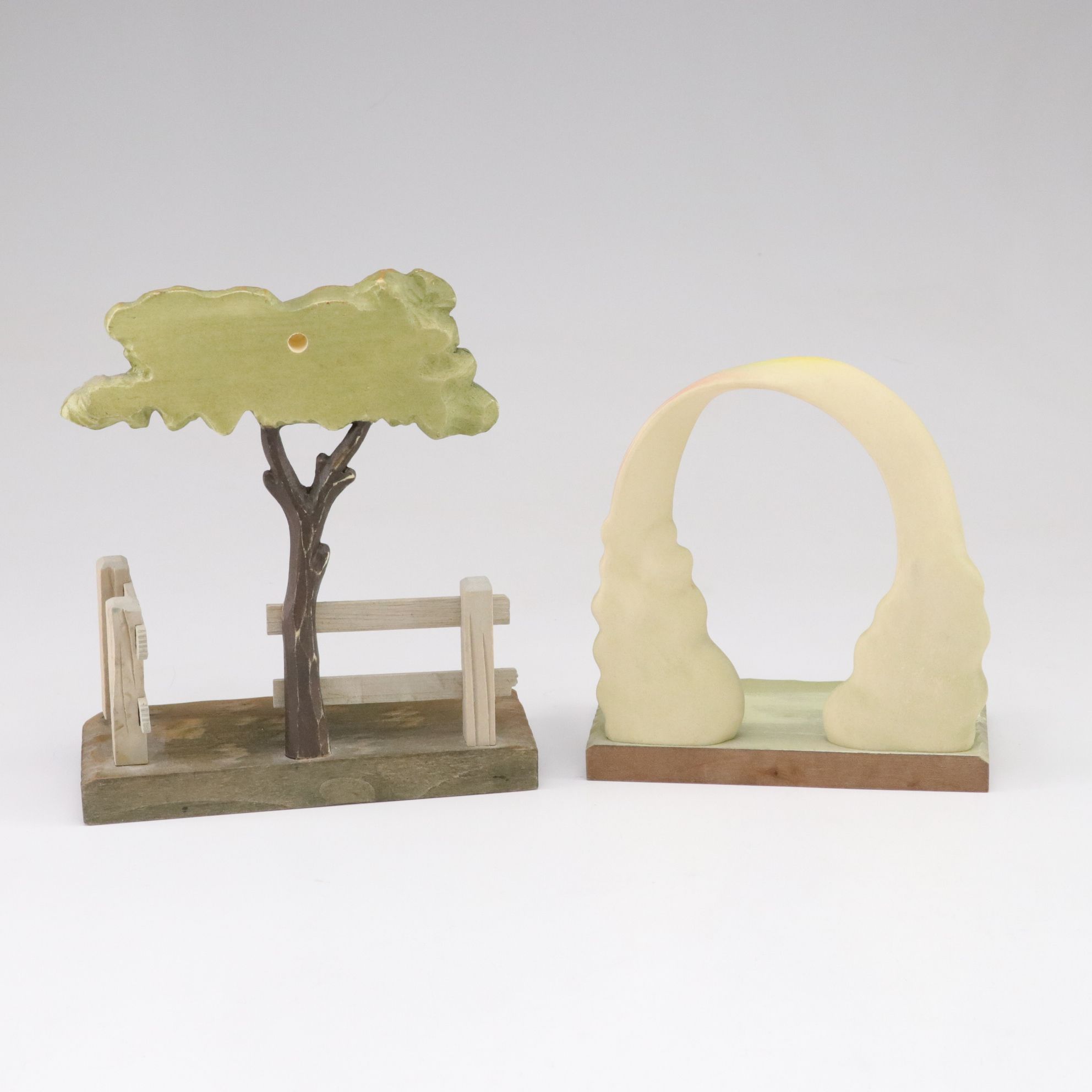 Eleven ANRI Painted Carved Wood Figurines of Children with Two Display Stands