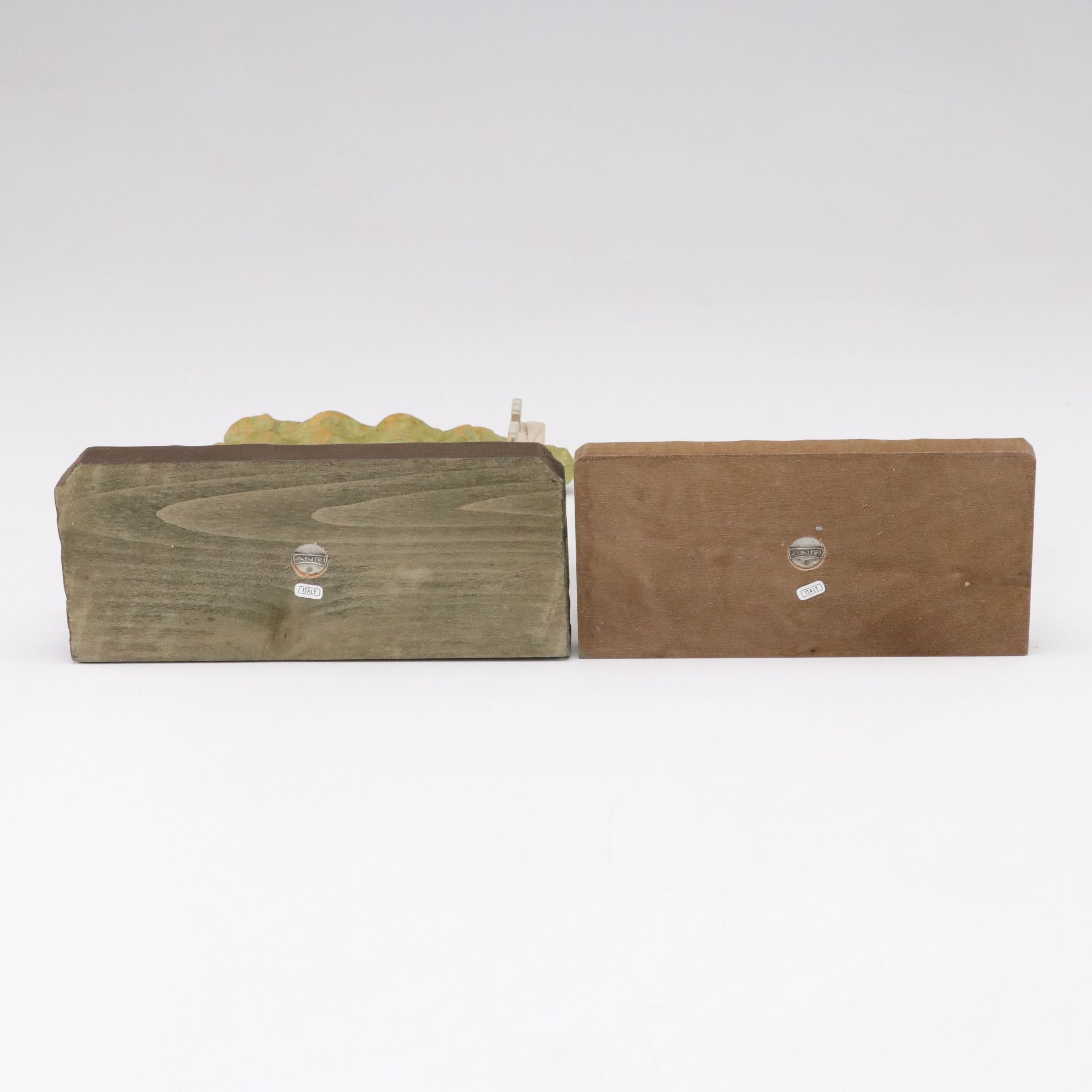 Eleven ANRI Painted Carved Wood Figurines of Children with Two Display Stands