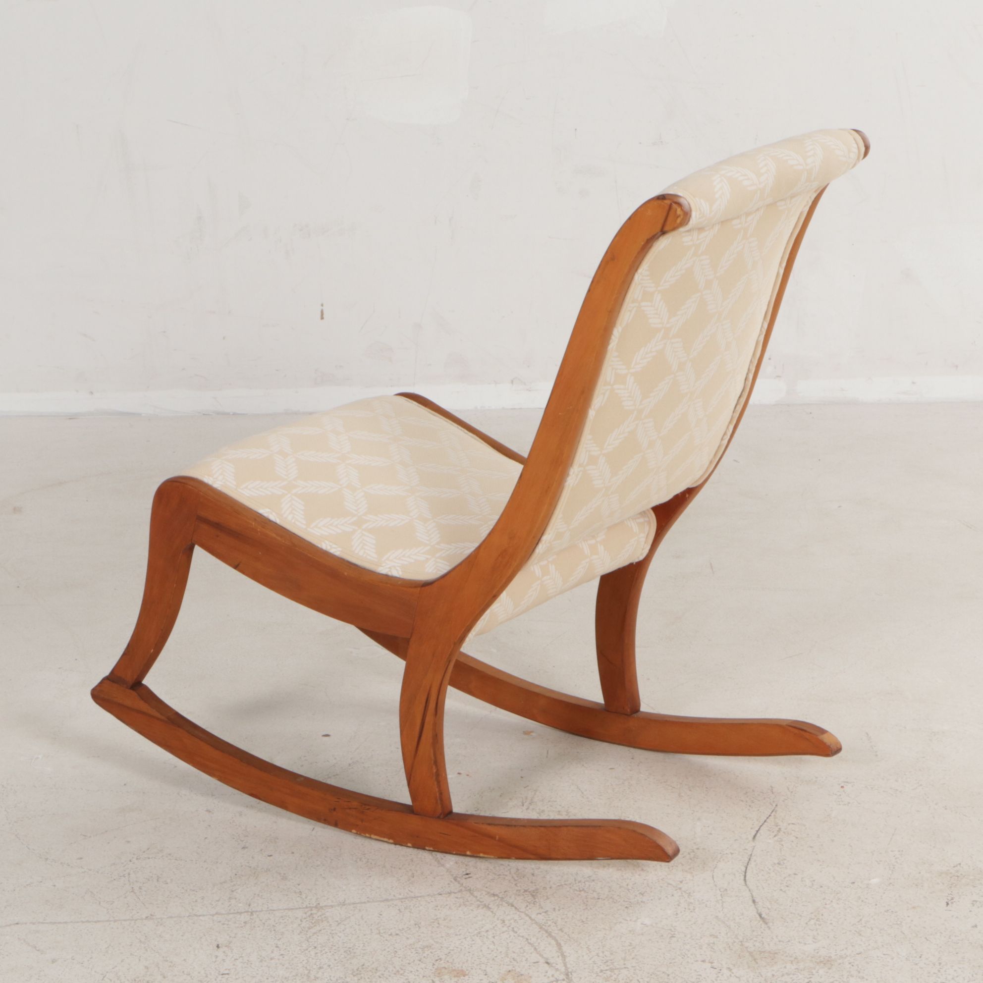 Oak Armless Sewing Rocker Features Woven Feather Motif Upholstry