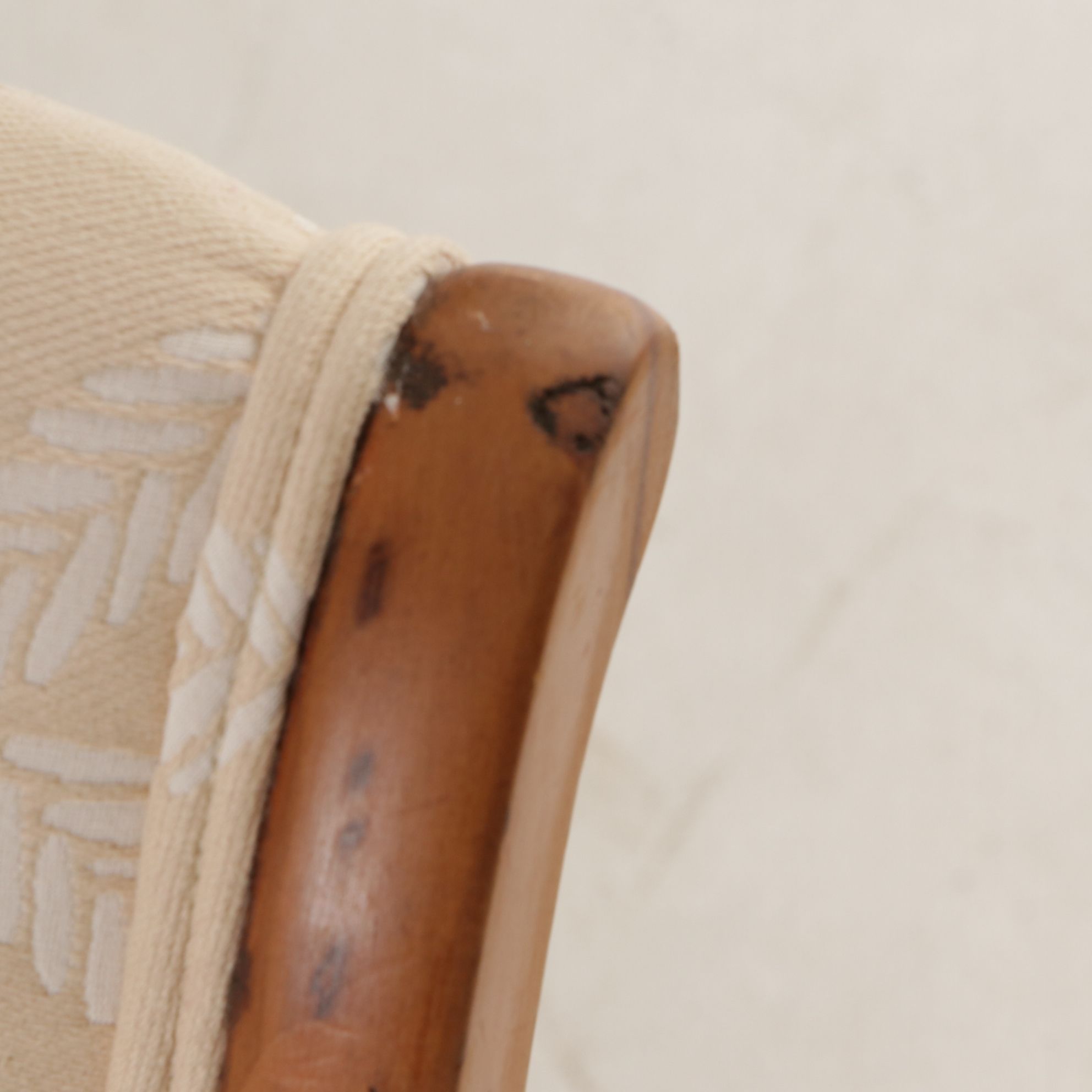 Oak Armless Sewing Rocker Features Woven Feather Motif Upholstry