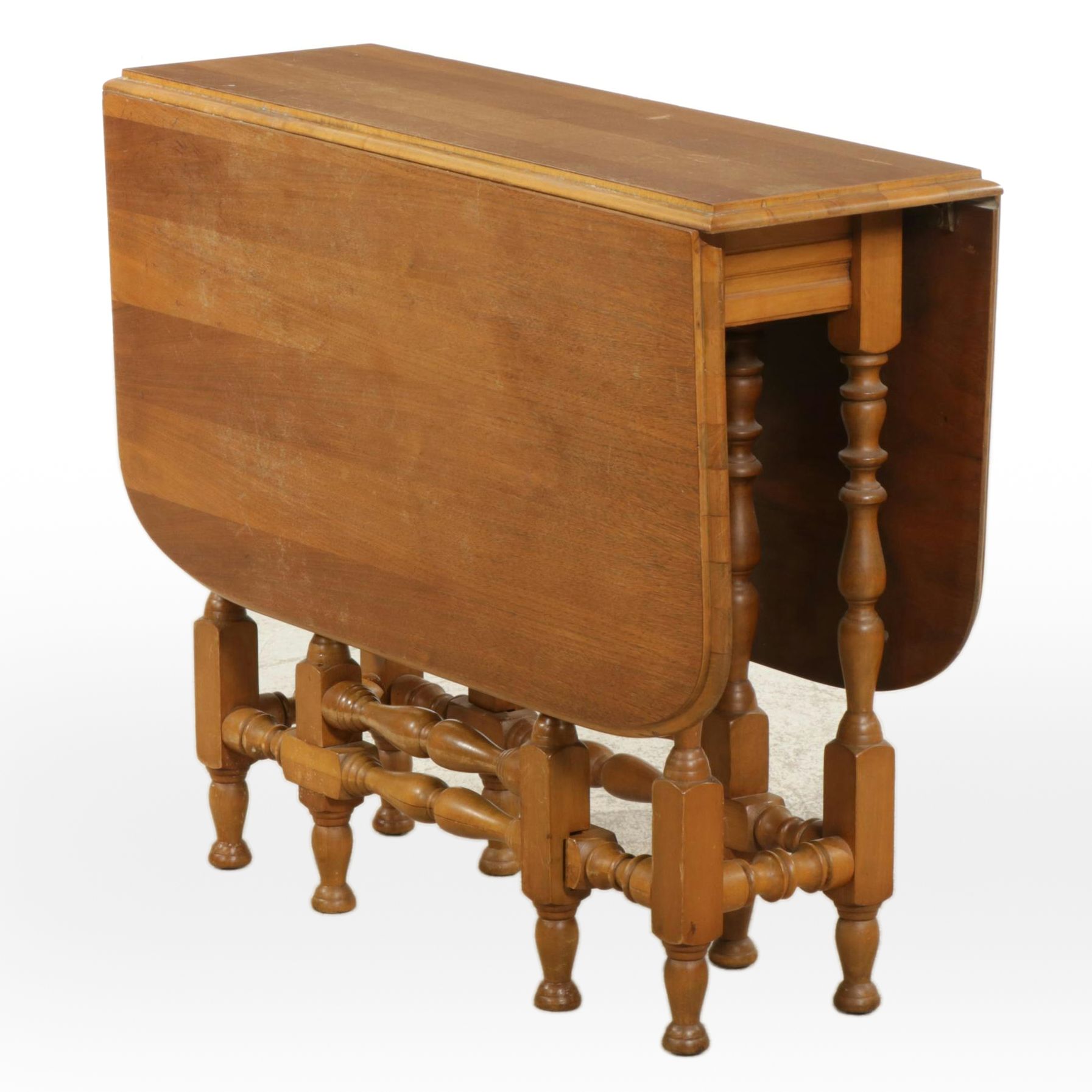 Veneer-Top Rectangular Gateleg Table With Beveled Edge and Turned Legs