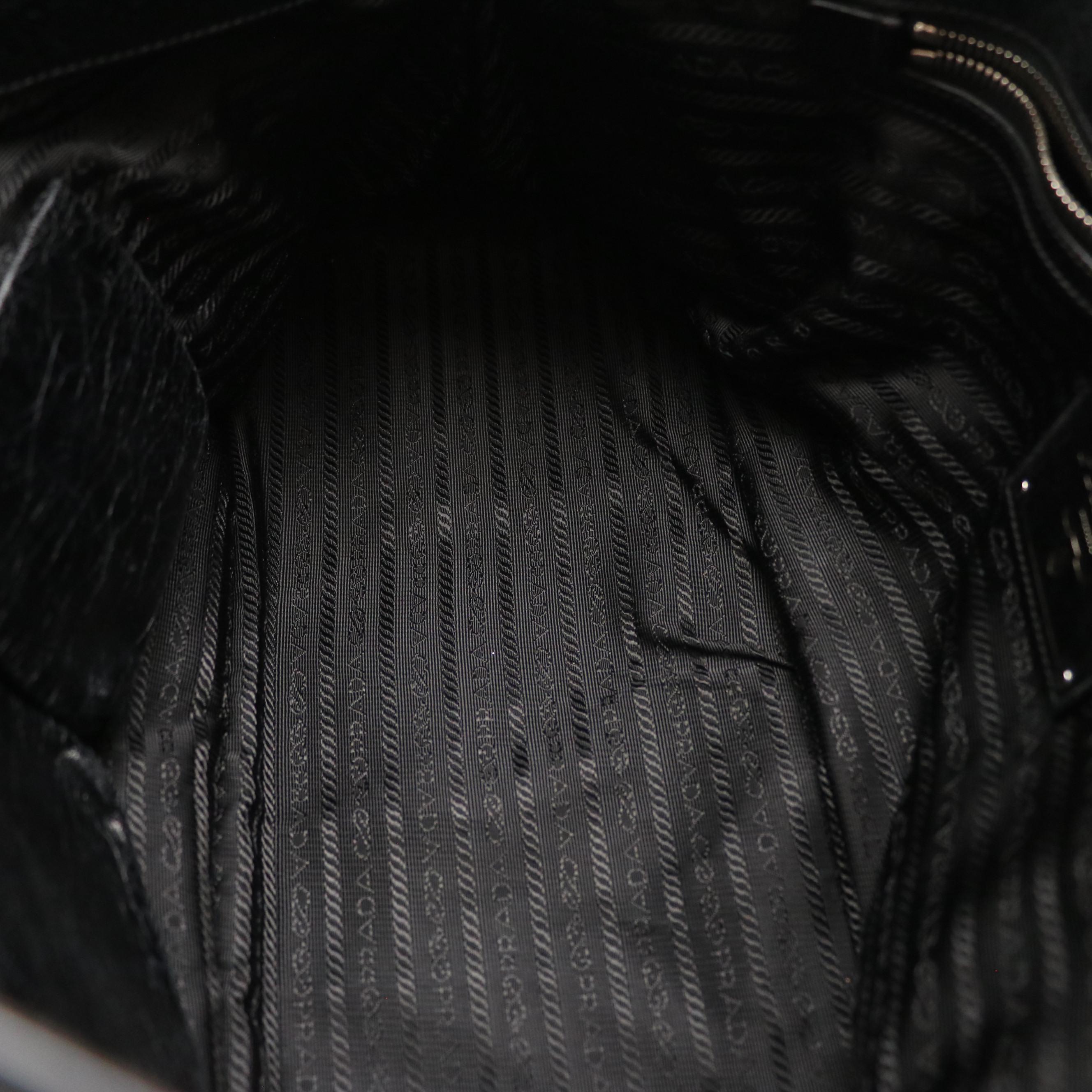 Prada Hinge Framed Two-Way Bag in Black Distressed Vitello Calfskin Leather