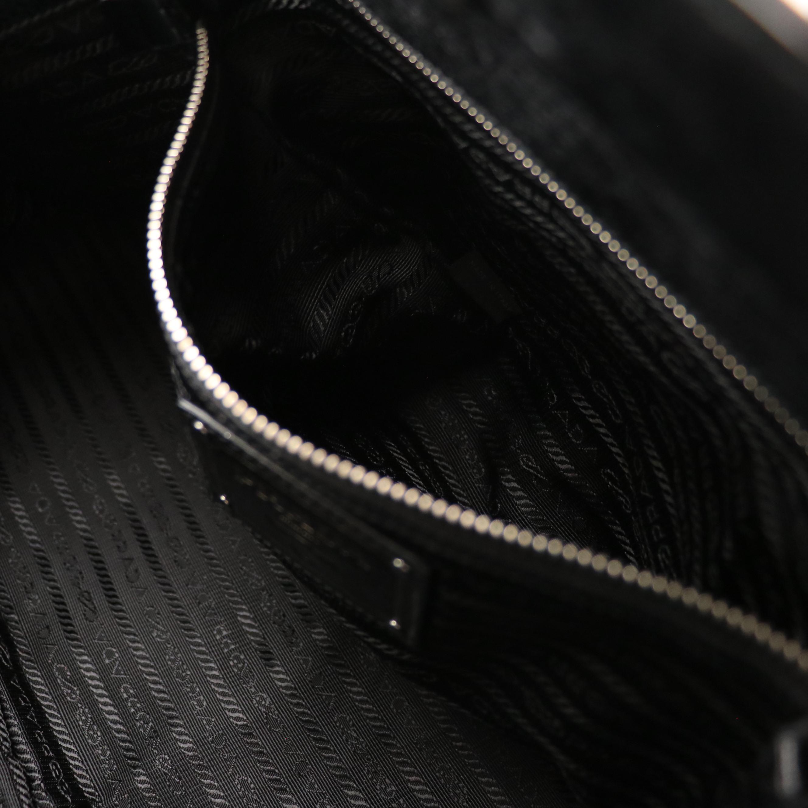 Prada Hinge Framed Two-Way Bag in Black Distressed Vitello Calfskin Leather