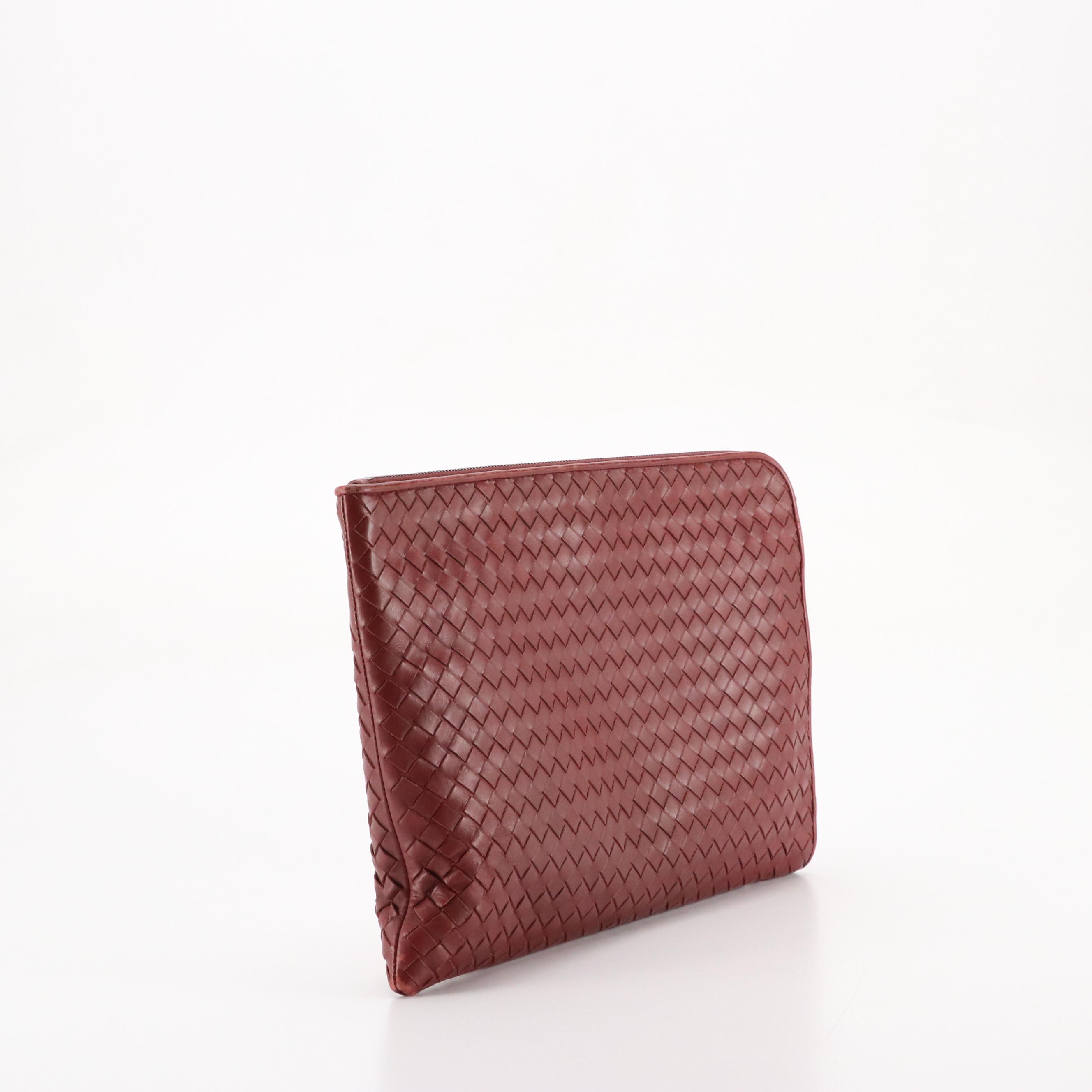 Bottega Veneta Zippered Clutch Bag in Merlot Red Intrecciato Leather