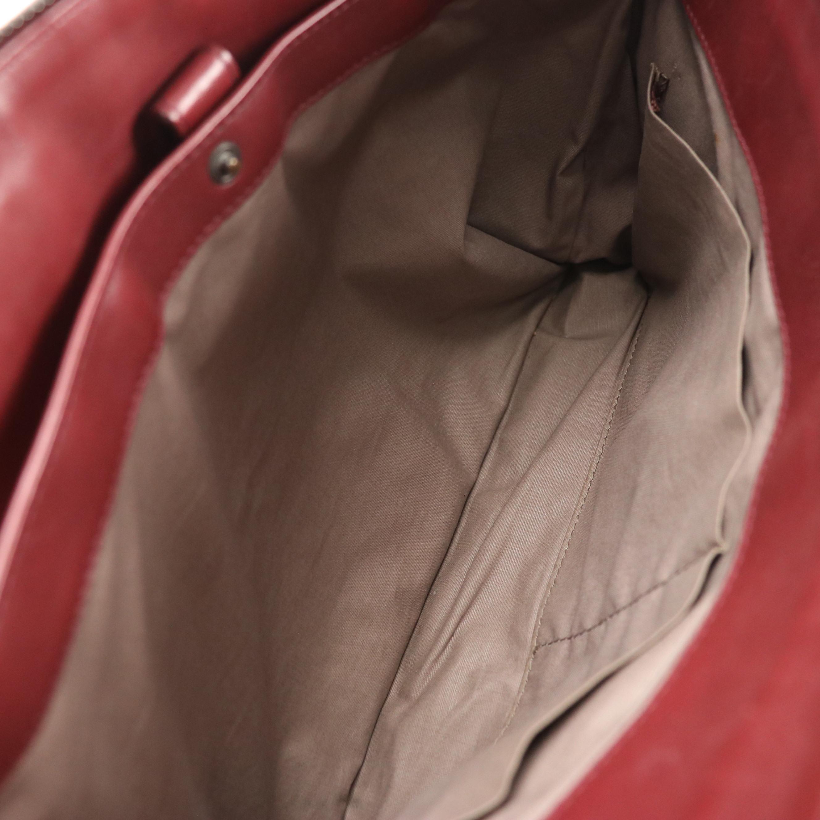 Bottega Veneta Zippered Clutch Bag in Merlot Red Intrecciato Leather