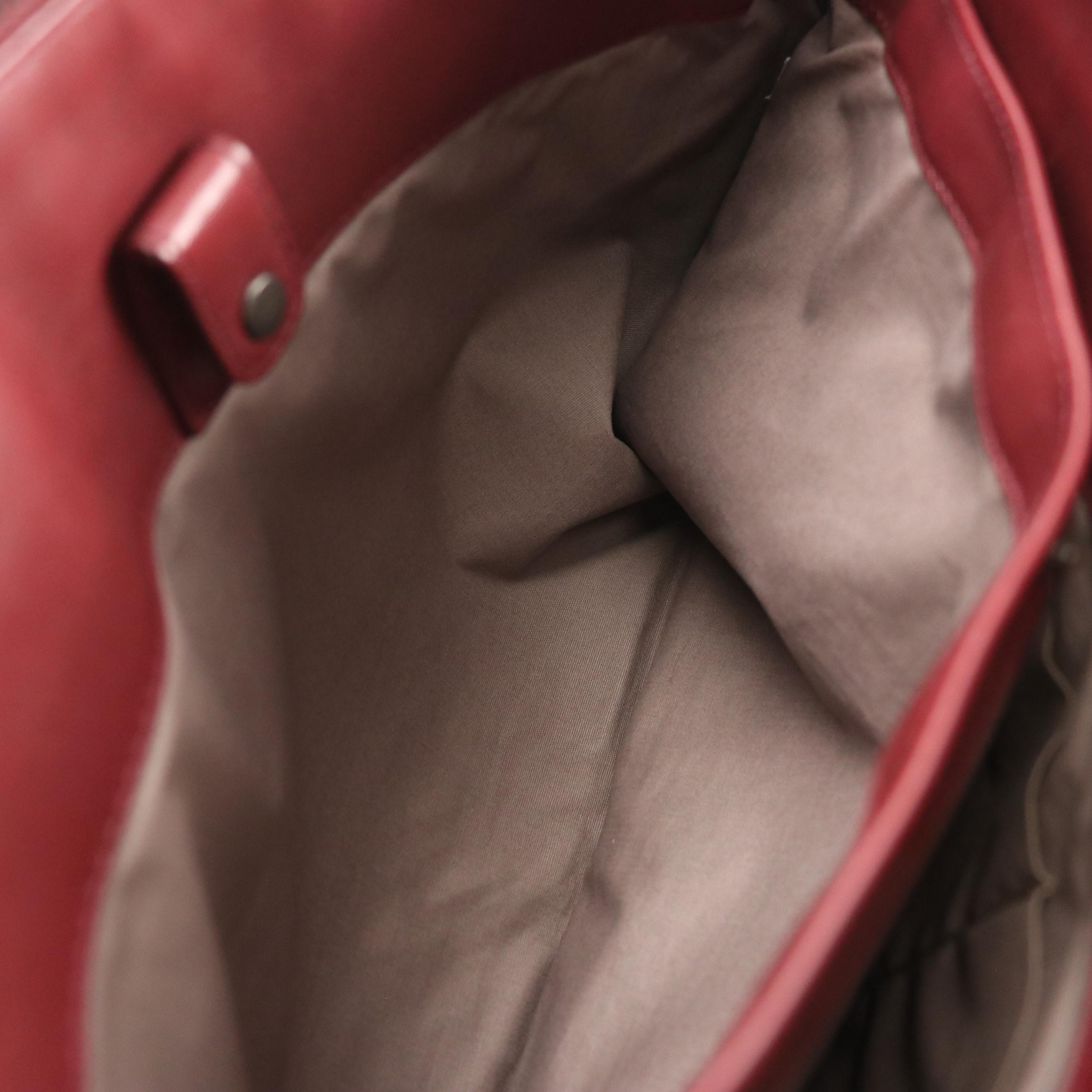 Bottega Veneta Zippered Clutch Bag in Merlot Red Intrecciato Leather