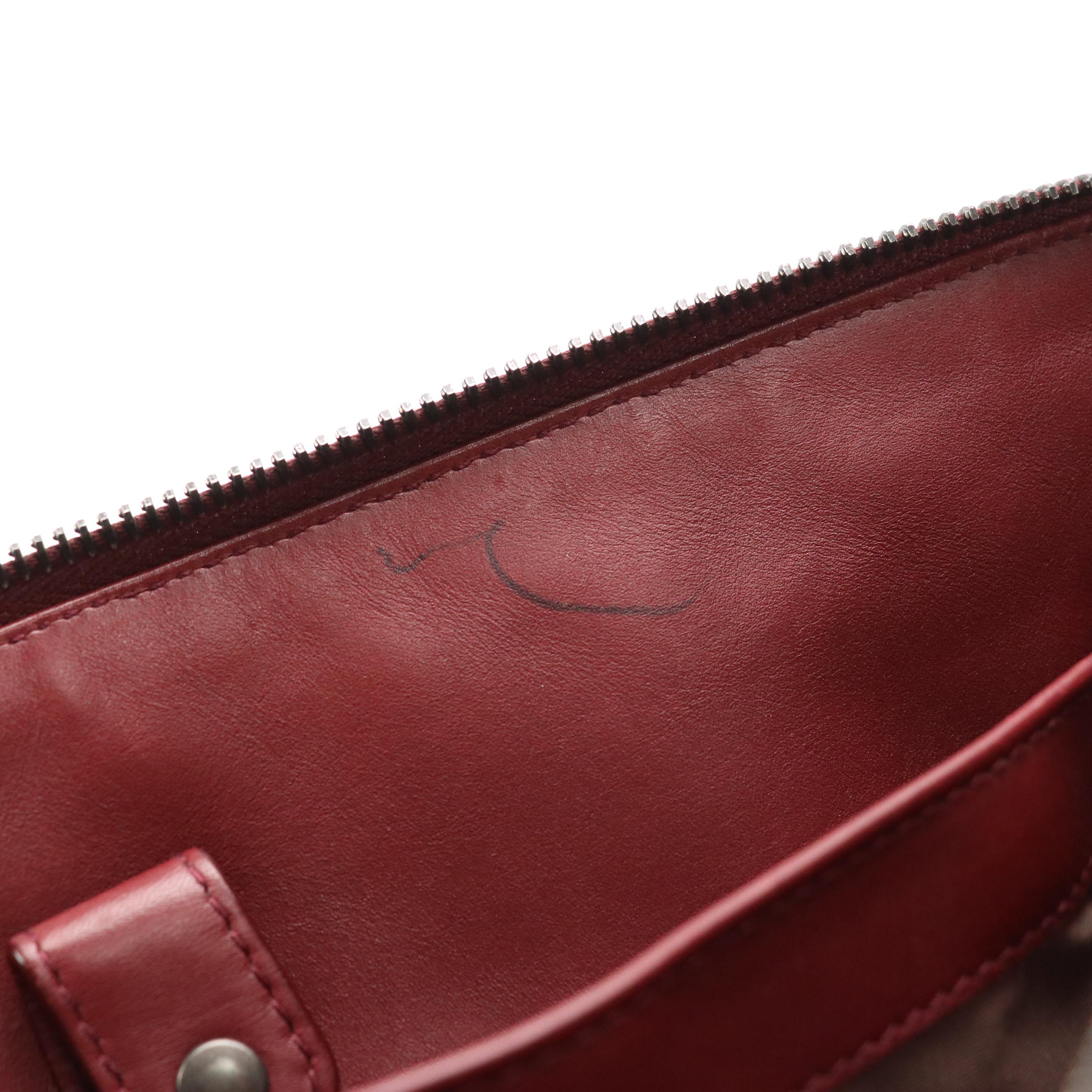 Bottega Veneta Zippered Clutch Bag in Merlot Red Intrecciato Leather