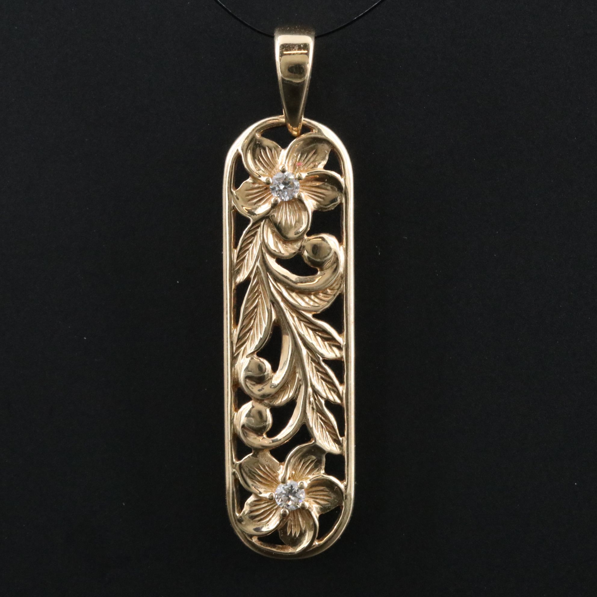 14K 0.08 CTW Diamond Floral Pendant