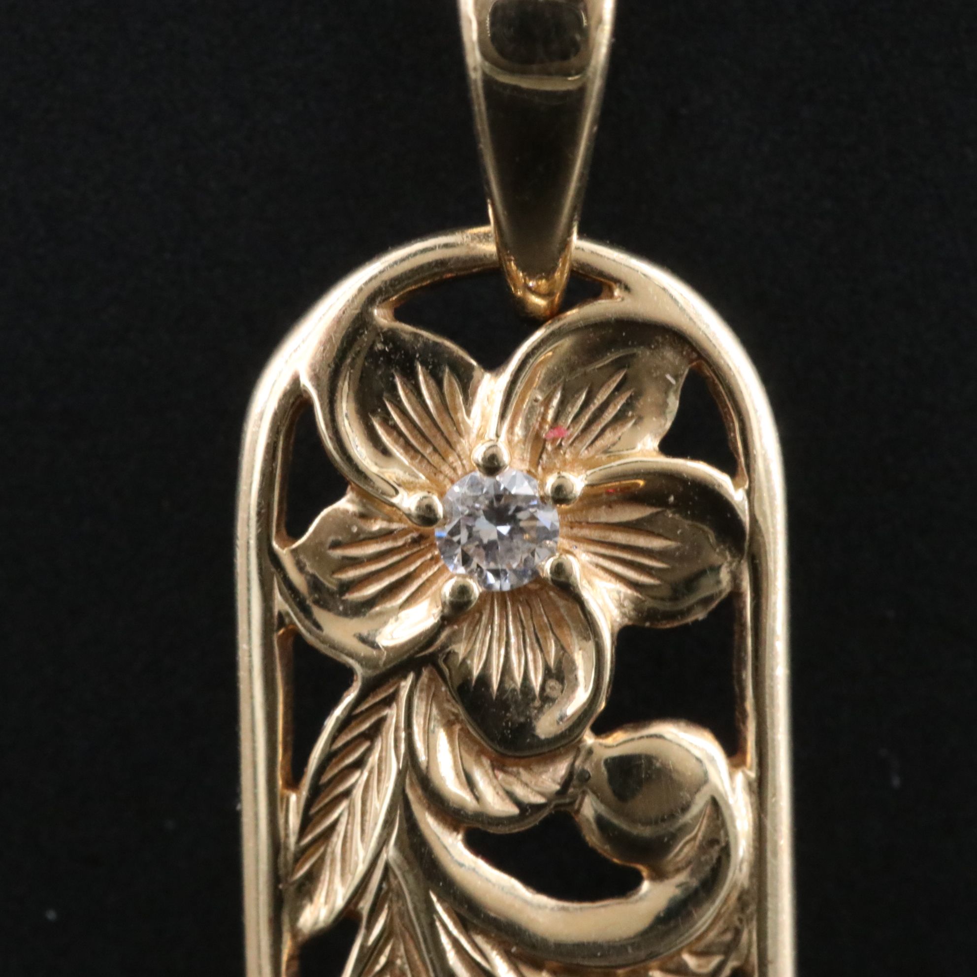14K 0.08 CTW Diamond Floral Pendant