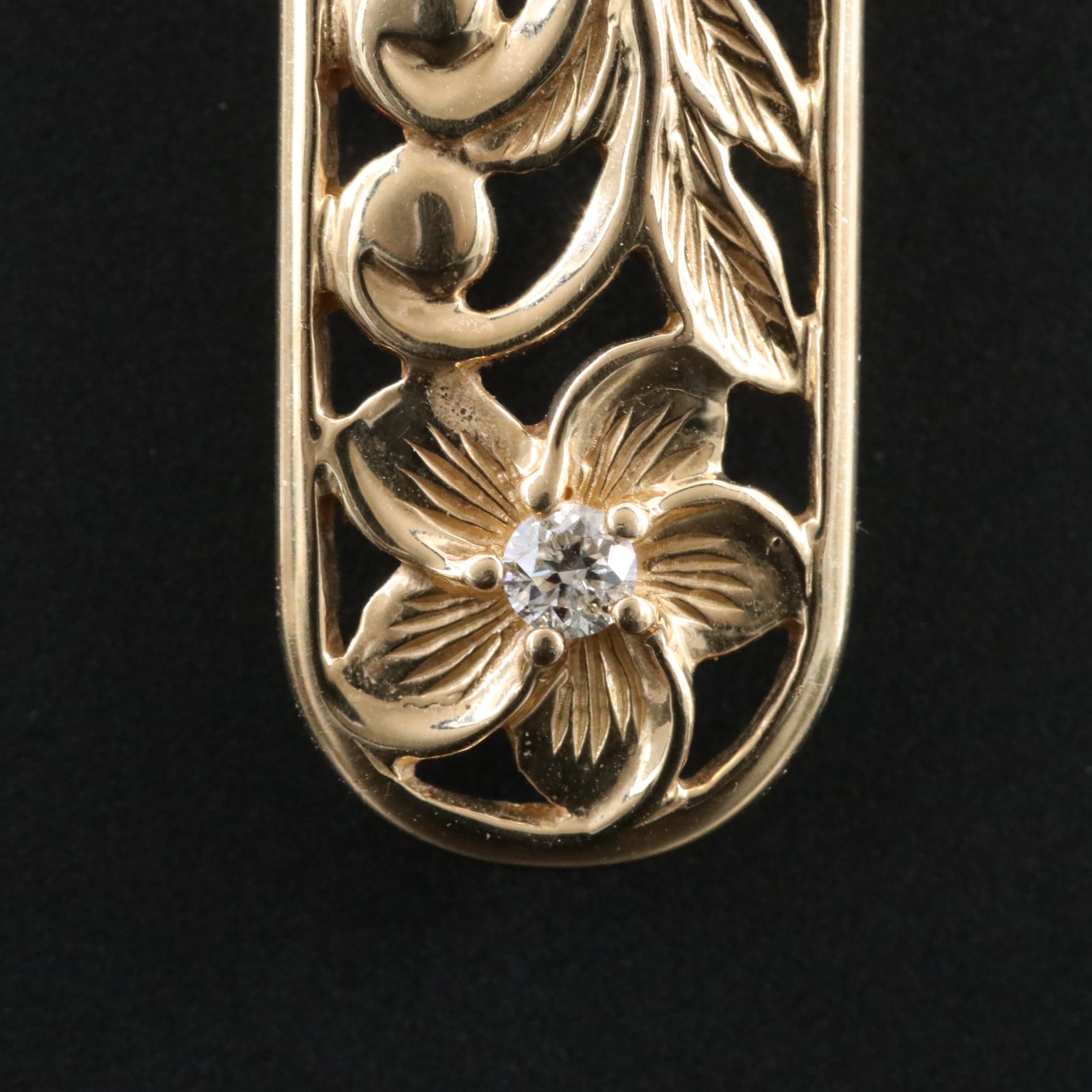 14K 0.08 CTW Diamond Floral Pendant