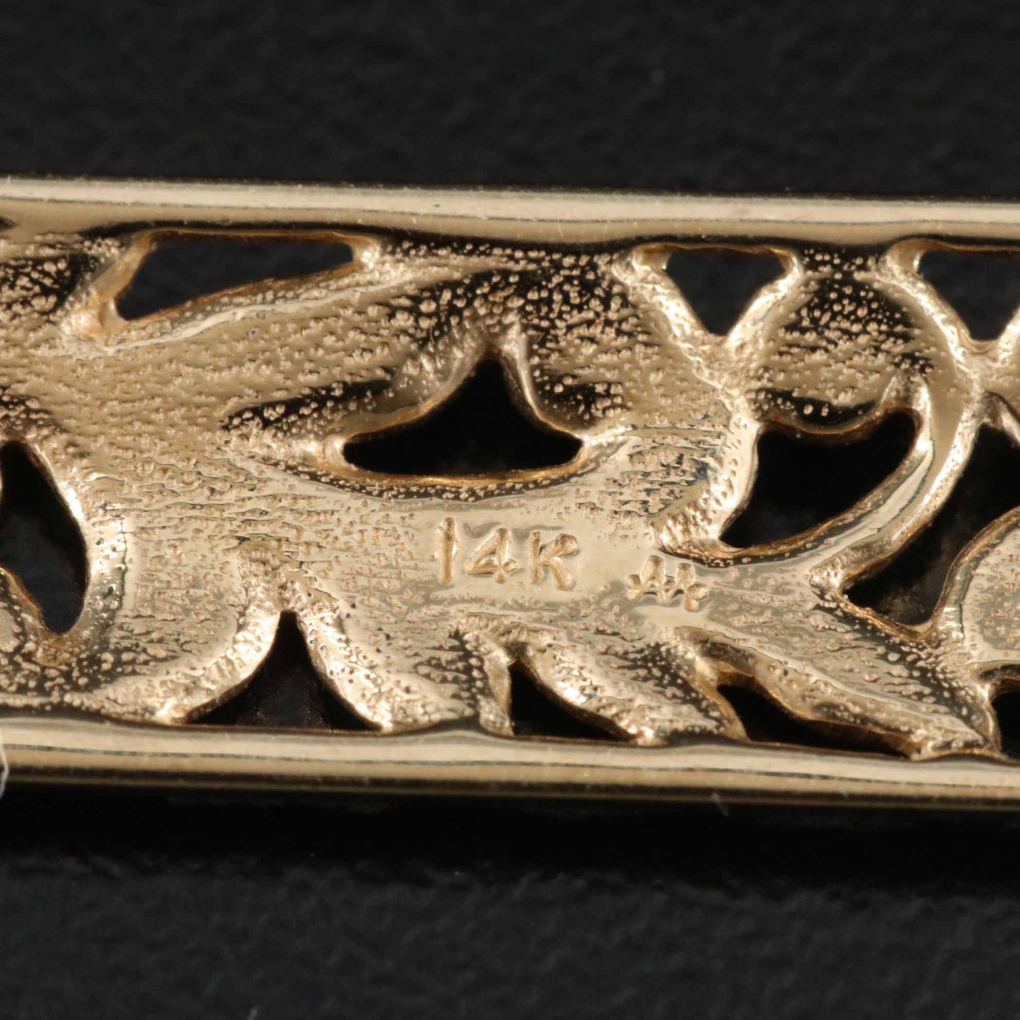 14K 0.08 CTW Diamond Floral Pendant