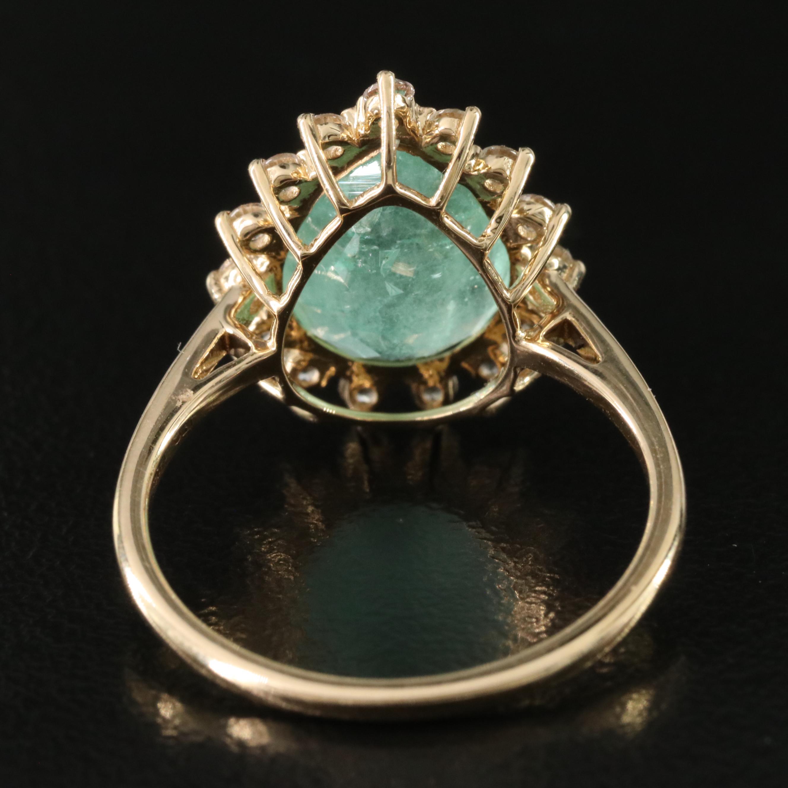 14K 3.02 CT Emerald and White Topaz Ring