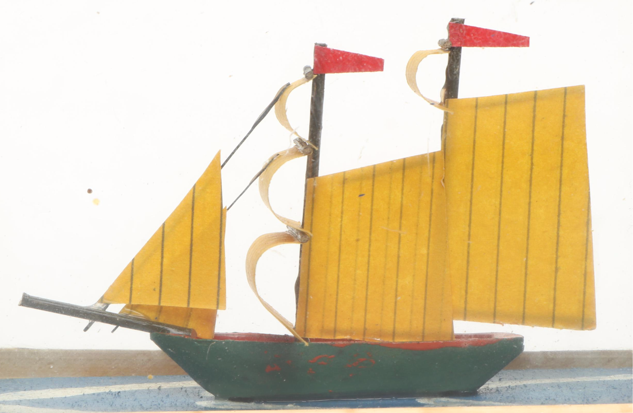 Handmade Paper and Polychrome Wood Model Ship in Bamboo and Glass Case
