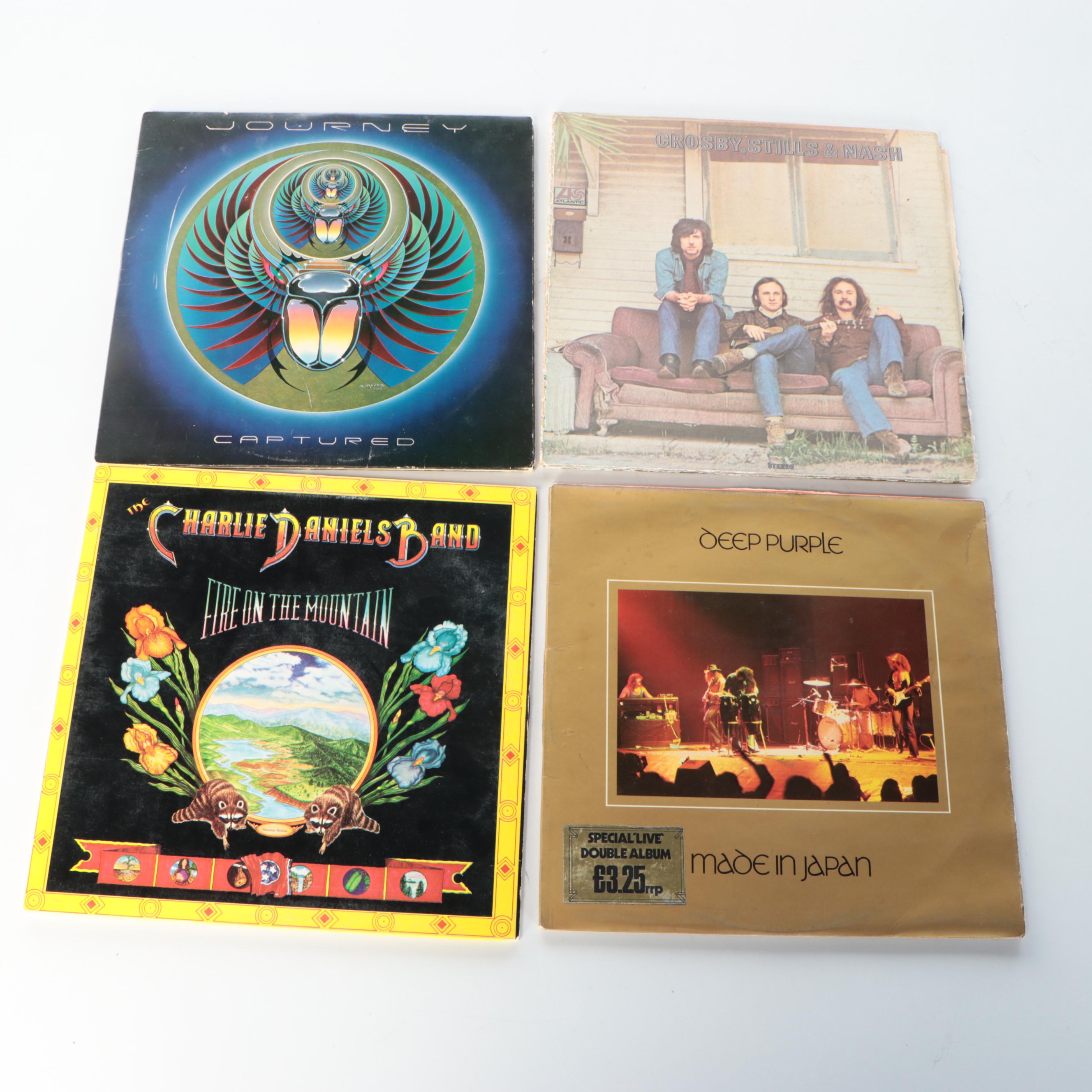 Journey, The Beatles, Mike Oldfield, and More Vinyl Record Albums