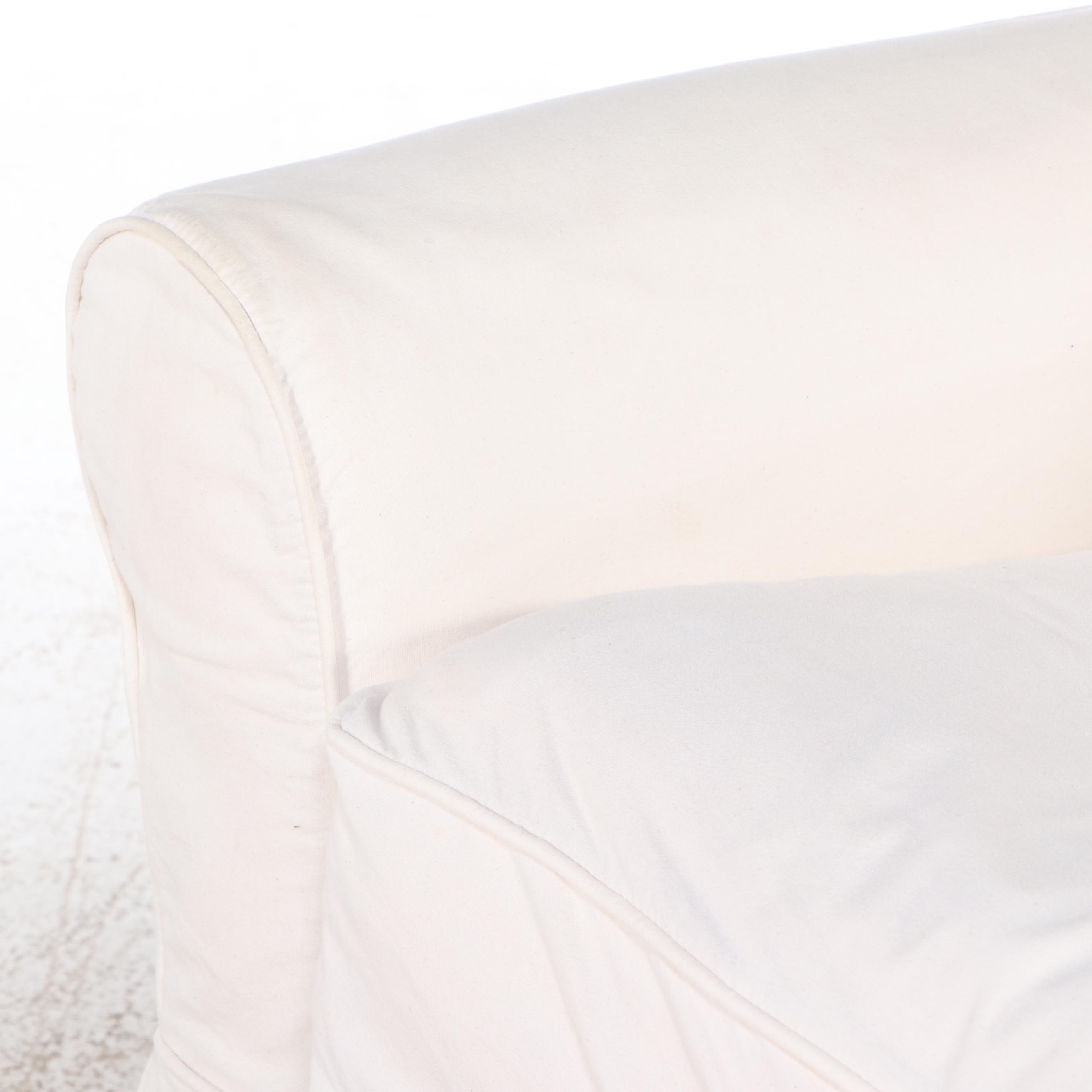 Slip Covered Armchairs with Ottomans and Interchangeable Covers