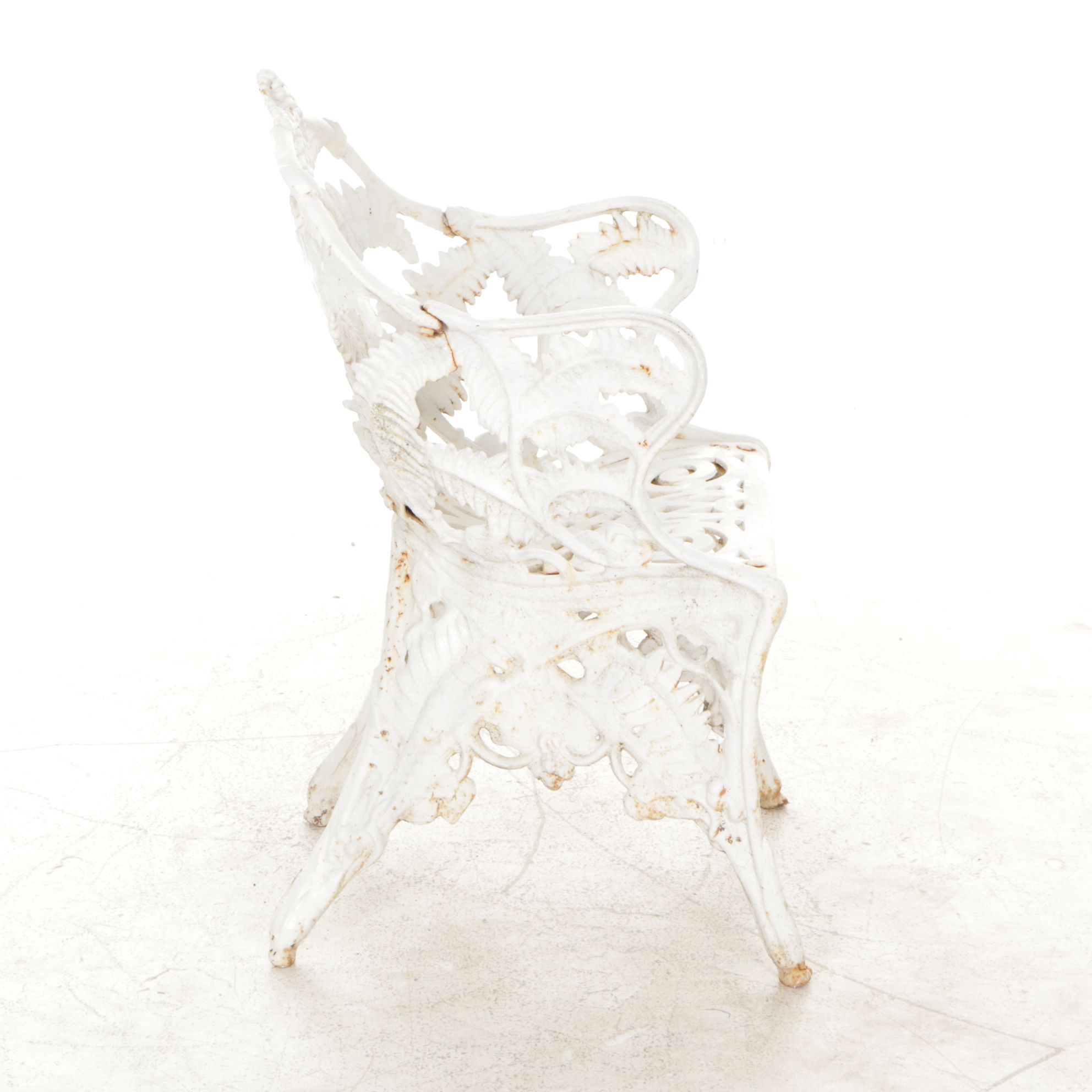 White-Painted Cast Iron Outdoor Chair With Fern Frond Back and Triangle Seat