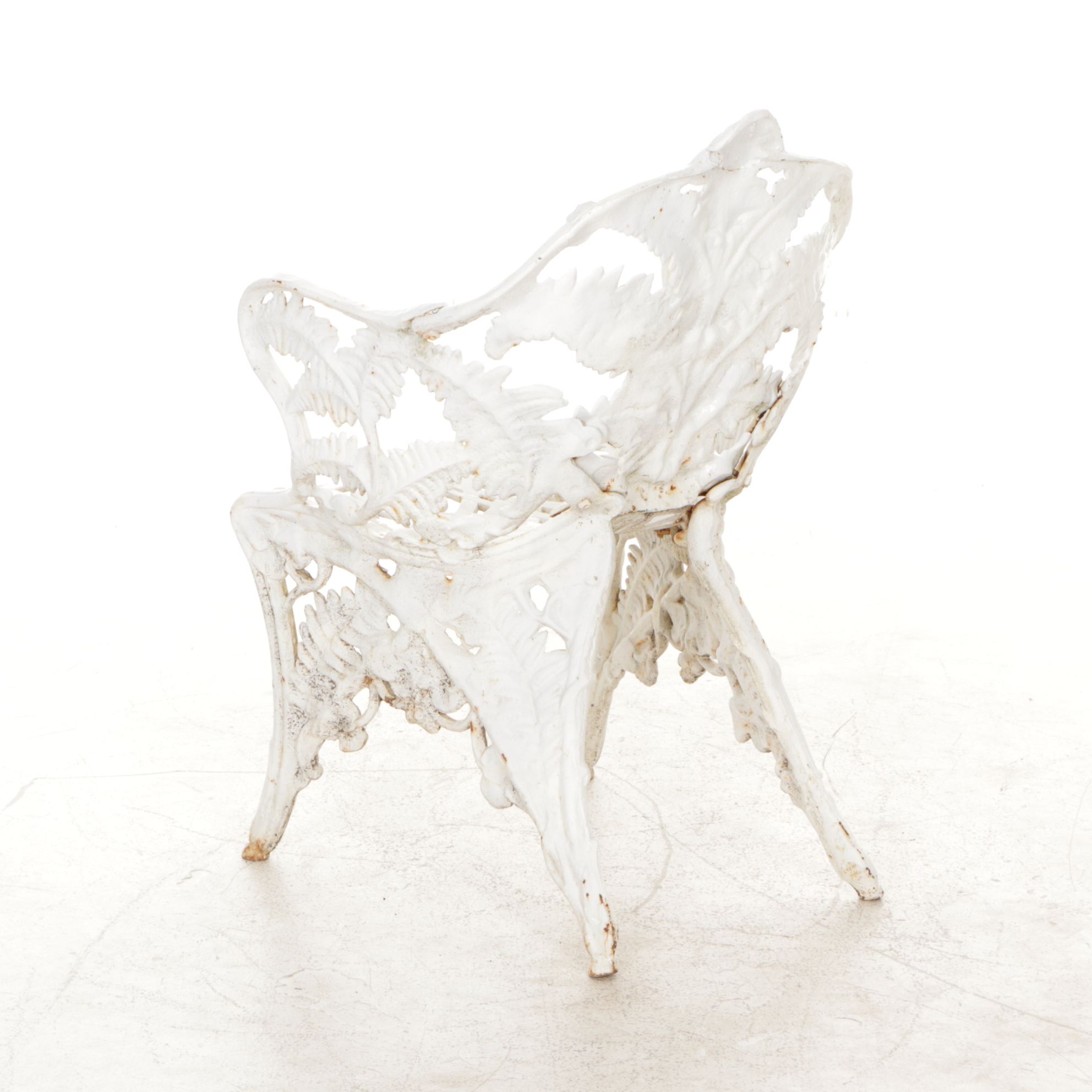 White-Painted Cast Iron Outdoor Chair With Fern Frond Back and Triangle Seat
