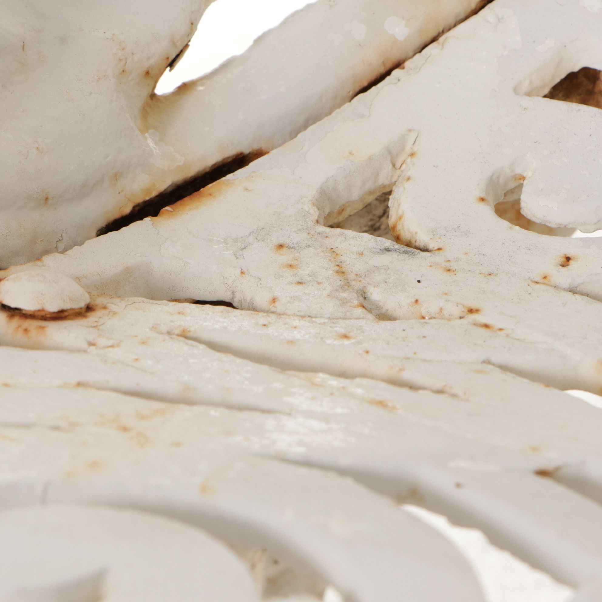 White-Painted Cast Iron Outdoor Chair With Fern Frond Back and Triangle Seat