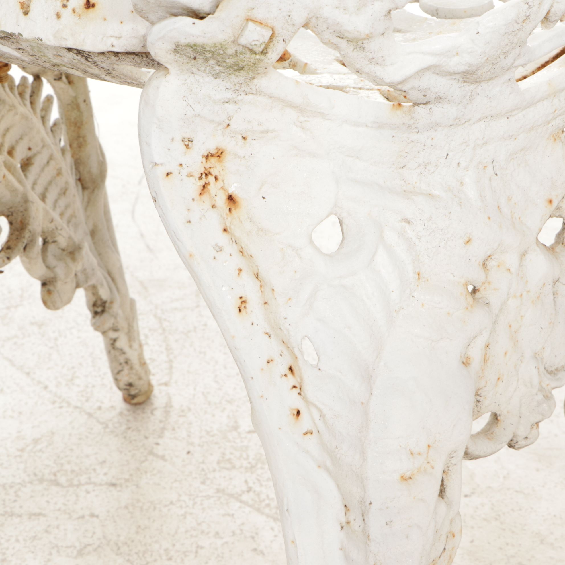 White-Painted Cast Iron Outdoor Chair With Fern Frond Back and Triangle Seat