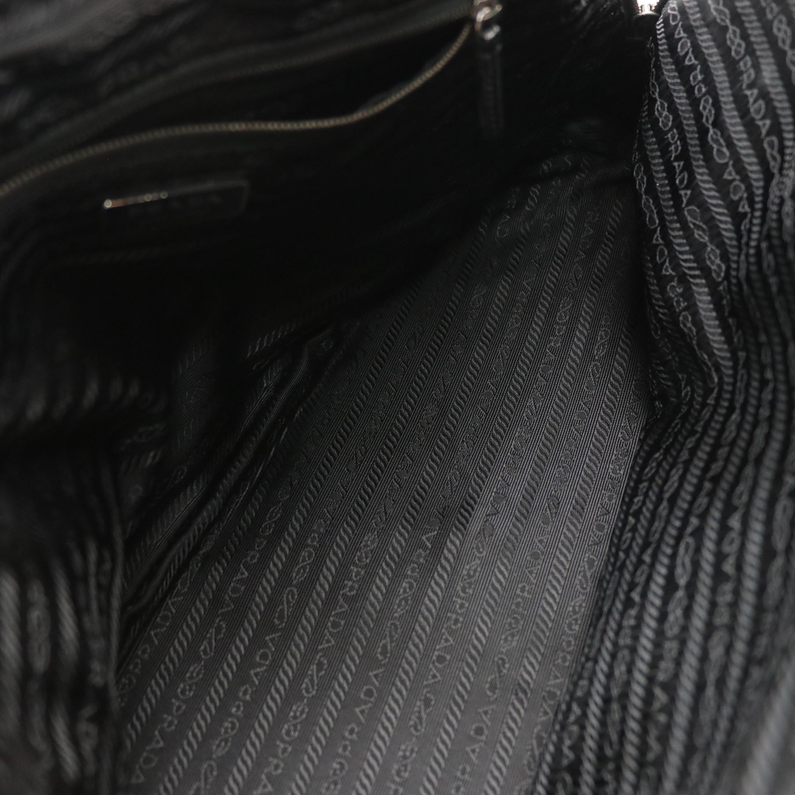 Prada Top Handle Locking Bag BN0477 in Textured Patent Leather