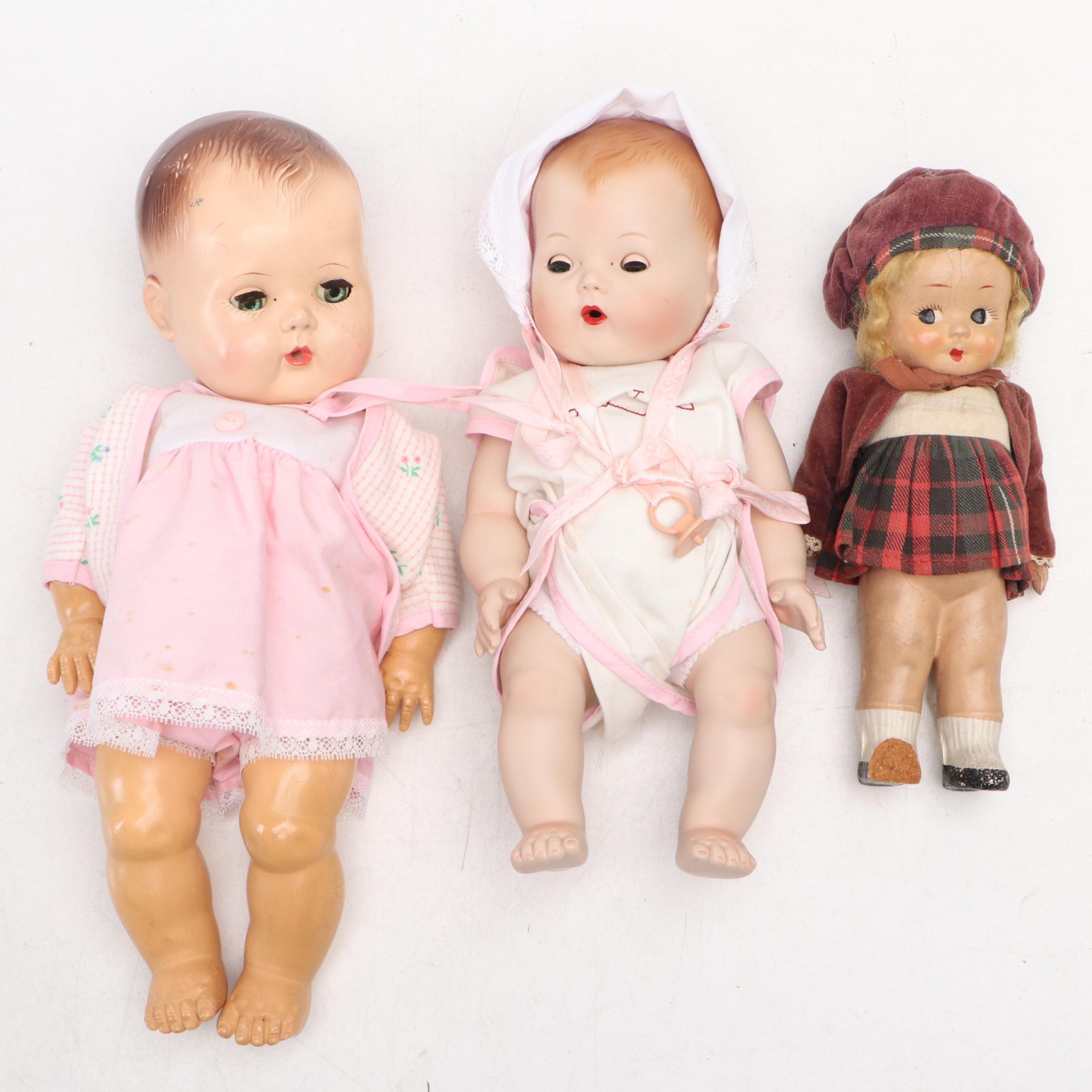 American Character Sleepy Eye Baby Doll with Other Composite and Porcelain Dolls