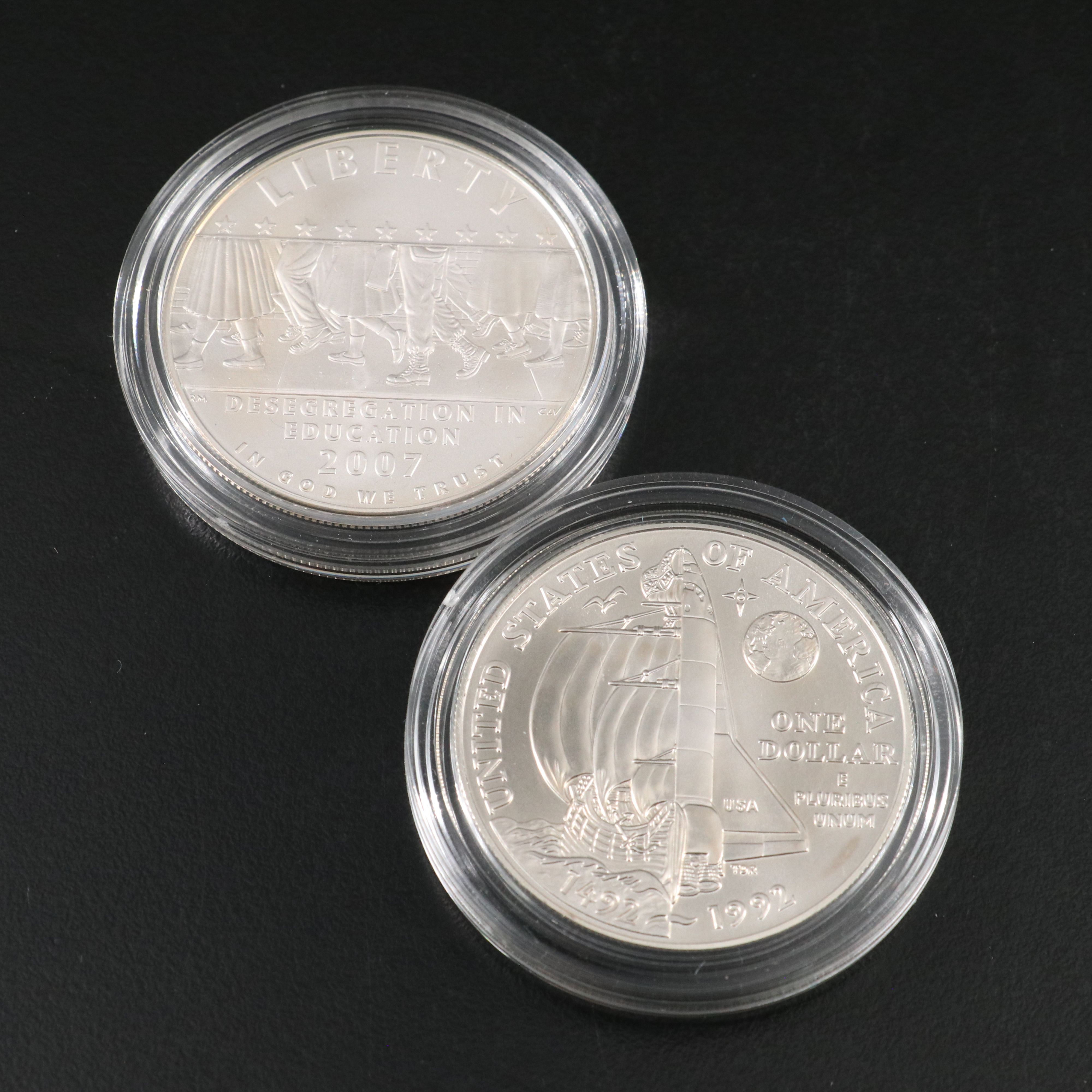 Four Modern Commemorative Uncirculated U.S. Silver Dollars